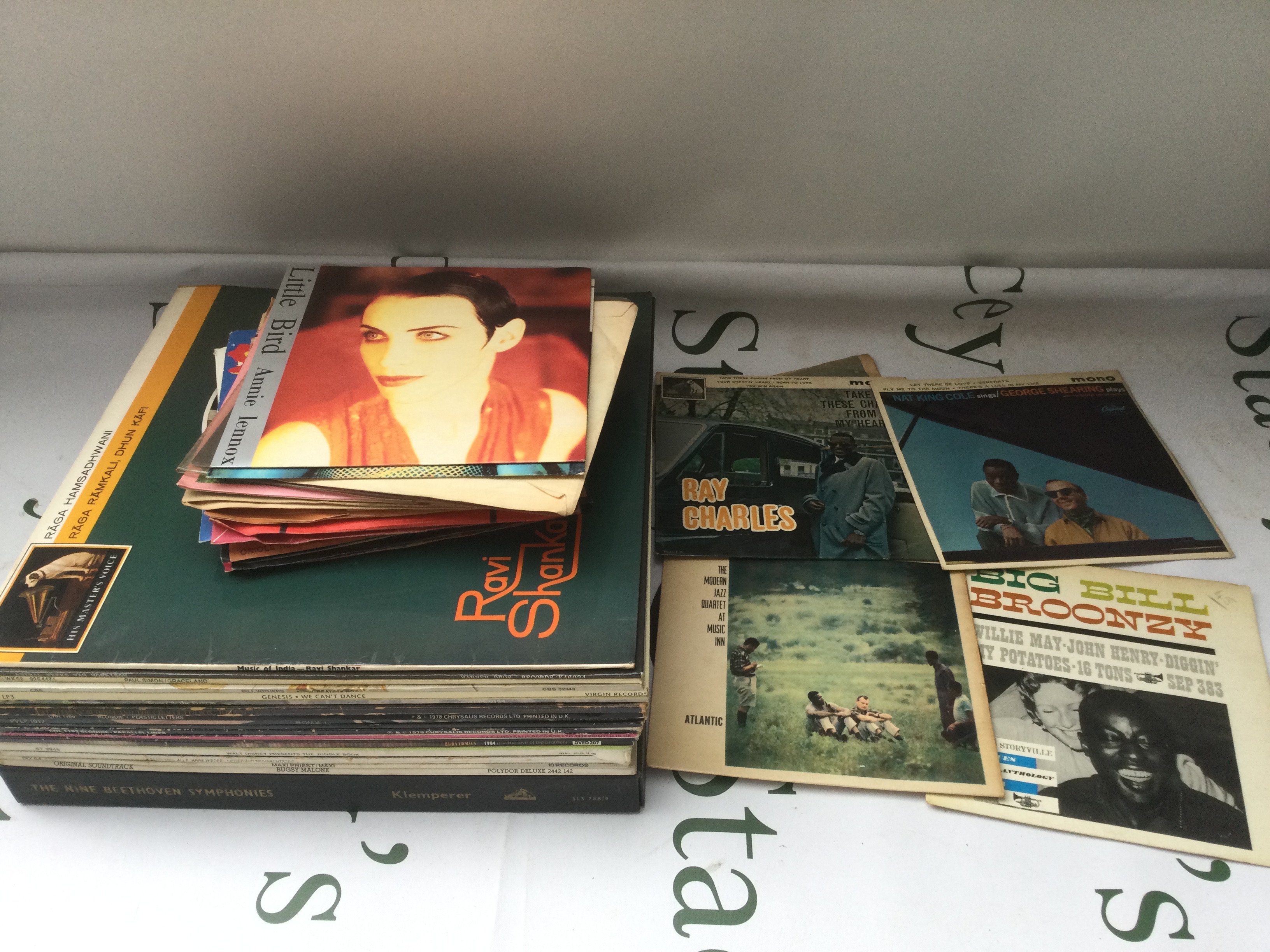 A record case containing a collection of LPs, EPs and 7" singles including jazz and blues artists.