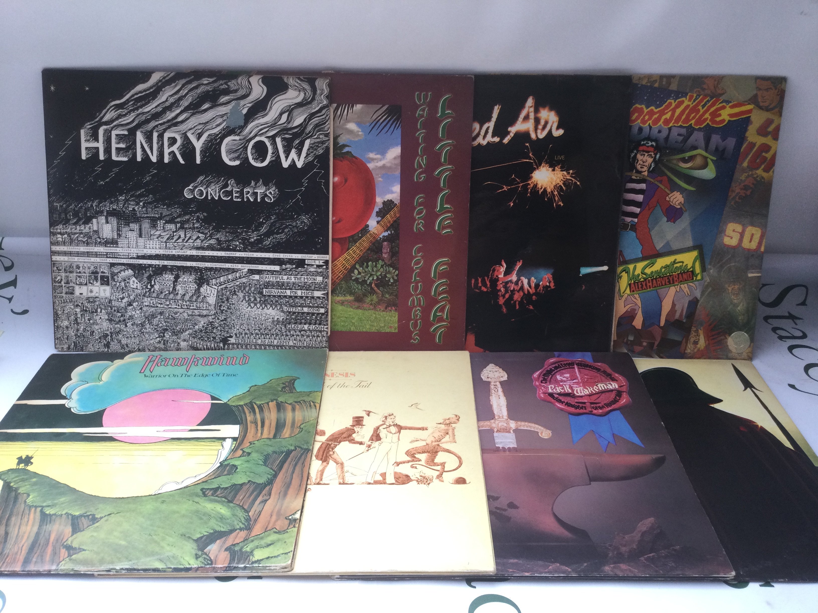 Eight prog rock LPs by various artists including Henry Cow, Hawkwind, Wishbone Ash and others.