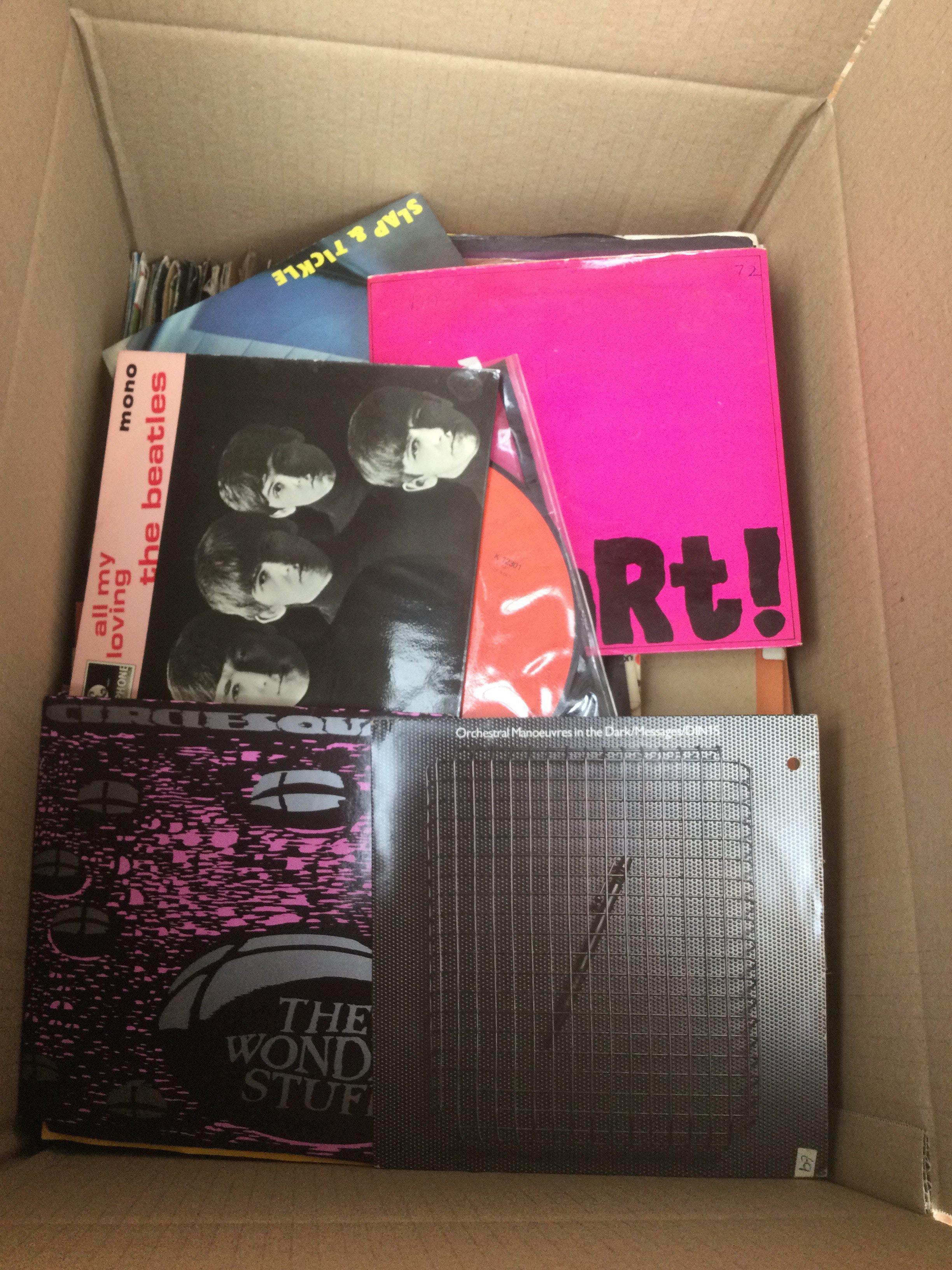 Two boxes of 7" singles and EPs by various artists including The Beatles, The Jam, T Rex, OMD and many more.