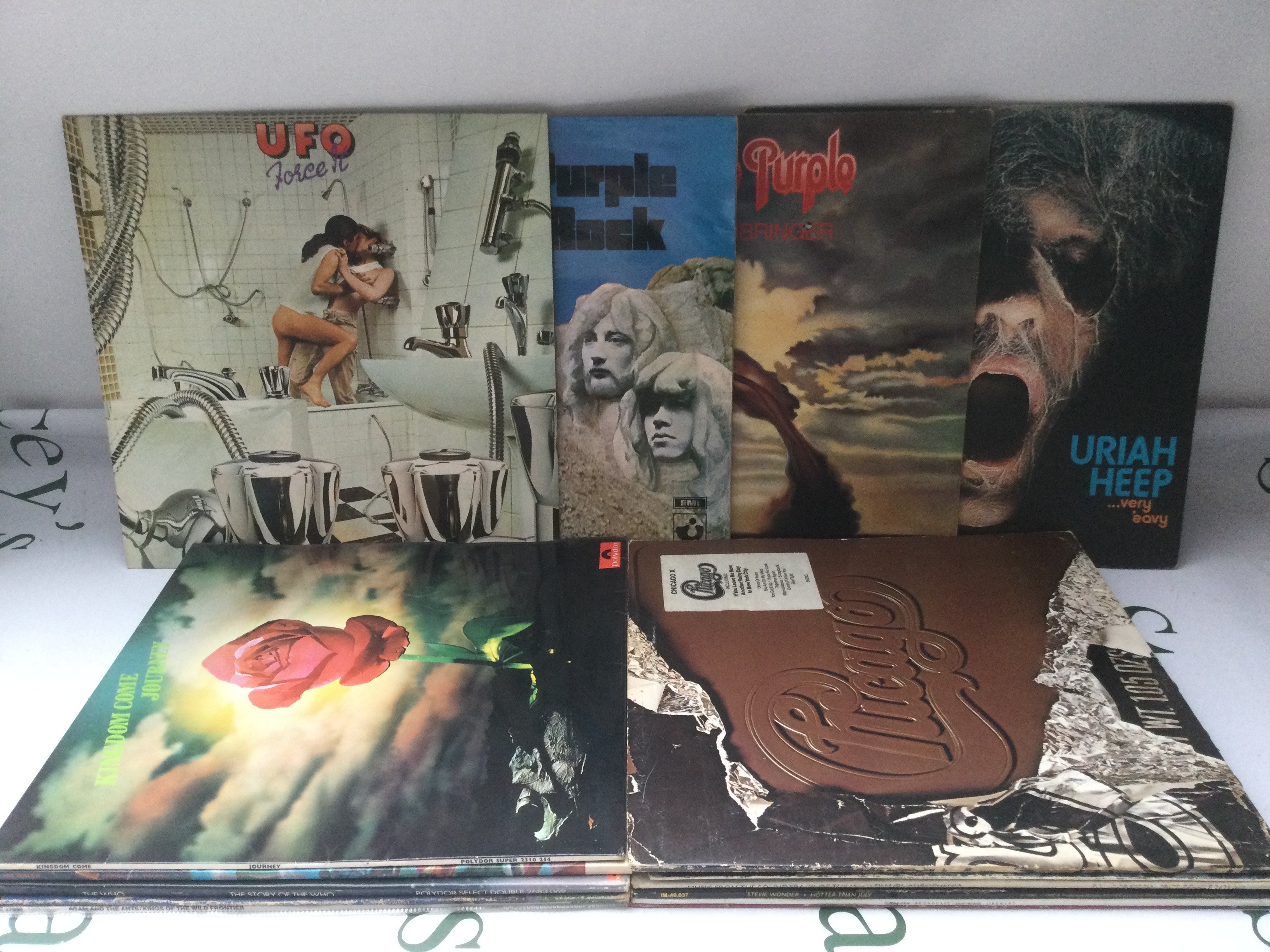 Fifteen LPs and 12" singles by various artists including Deep Purple, UFO and others.