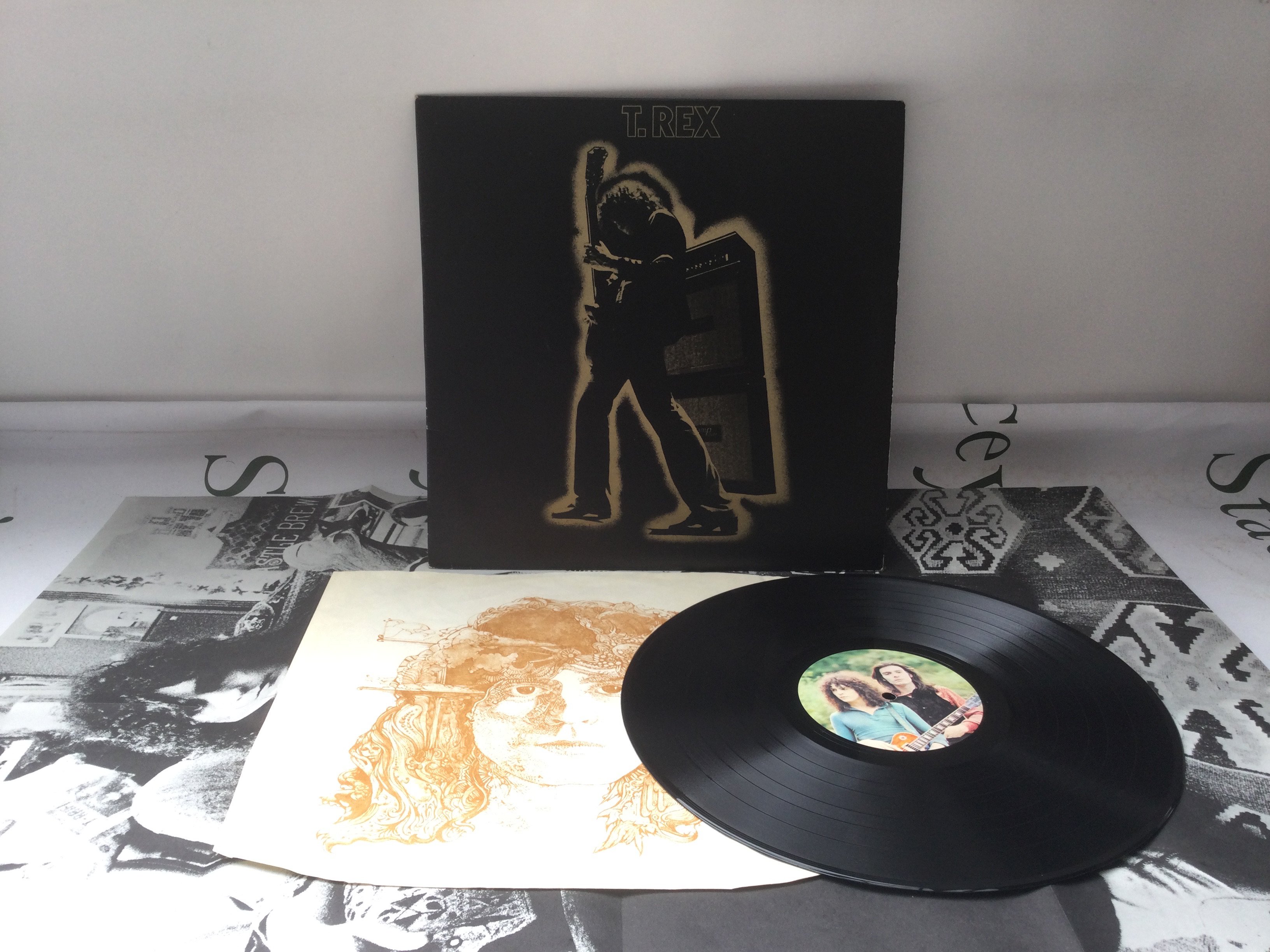 A first UK pressing of Electric Warrior by T Rex complete with inner sleeve and poster. EX/EX.