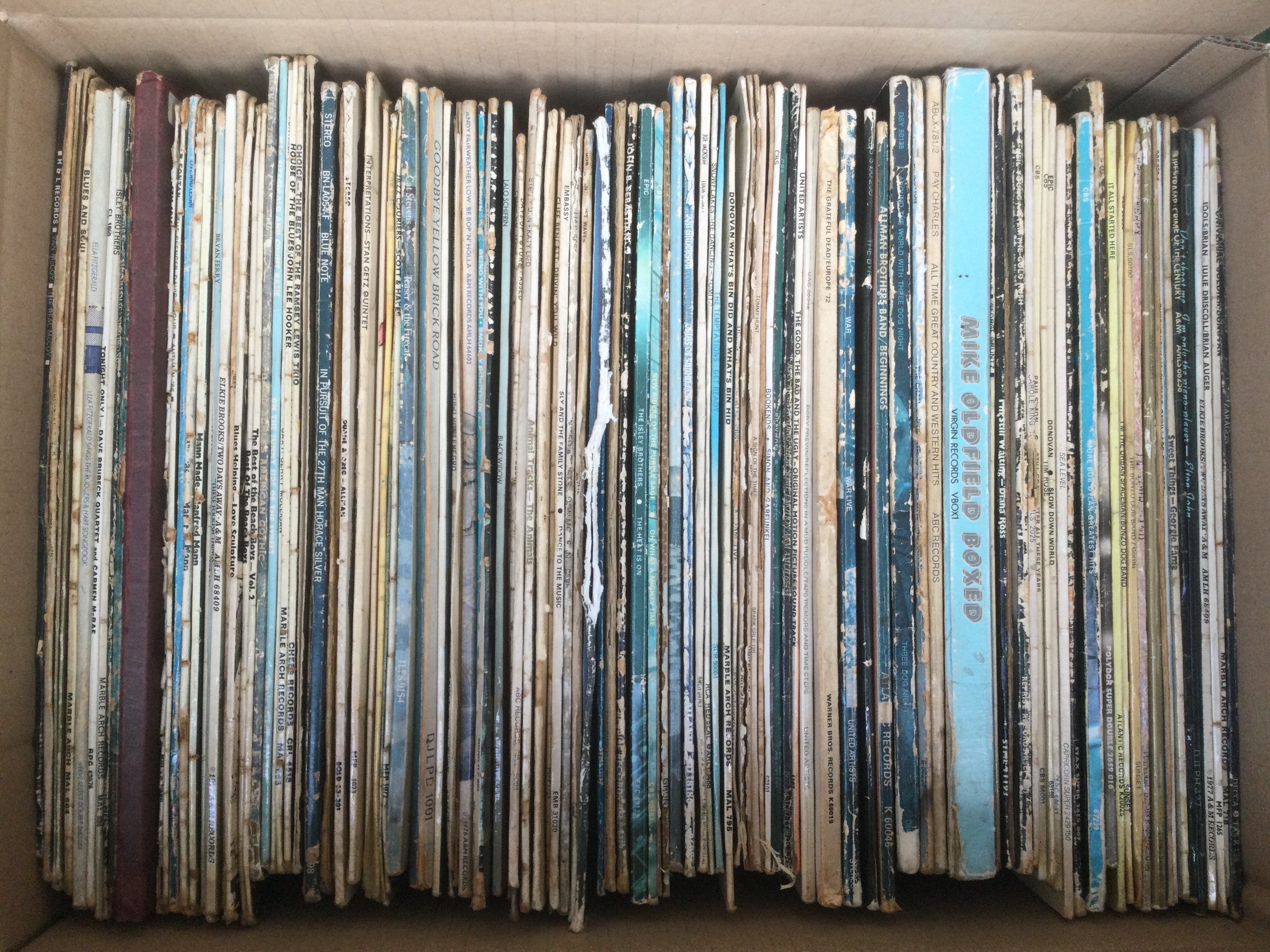 A box of LPs by various artists including Jethro Tull, Stan Getz, Donovan and many more.