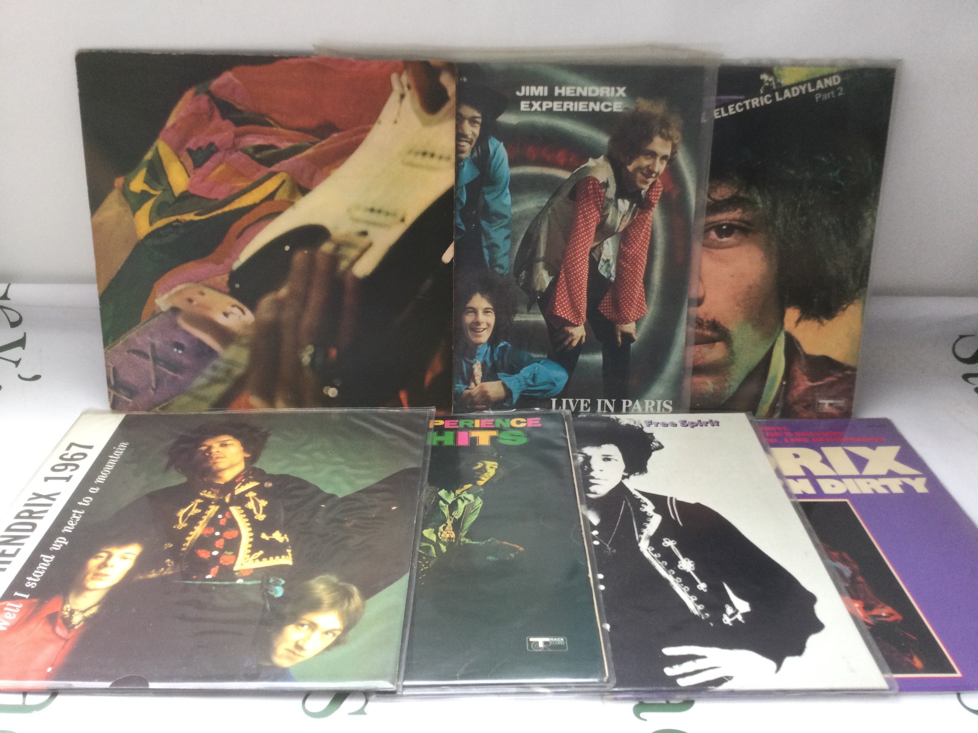 Seven Jimi Hendrix LPs including Band Of Gypsys, Live In Paris and others.