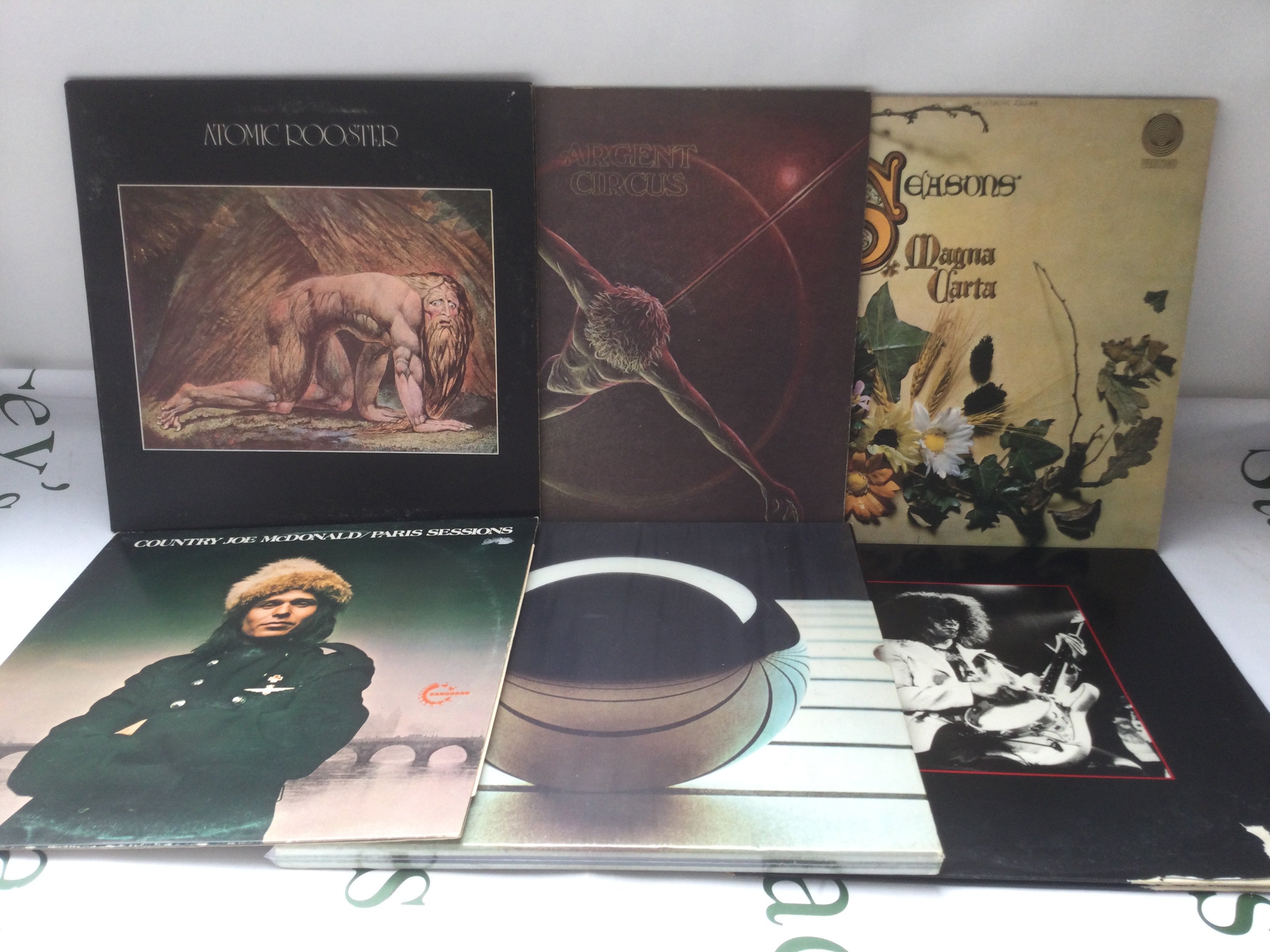 Six rock LPs by variius artists including a first UK pressing of Death Walks Behind You by Atomic Rooster, Magna Carta, T Rex and others.
