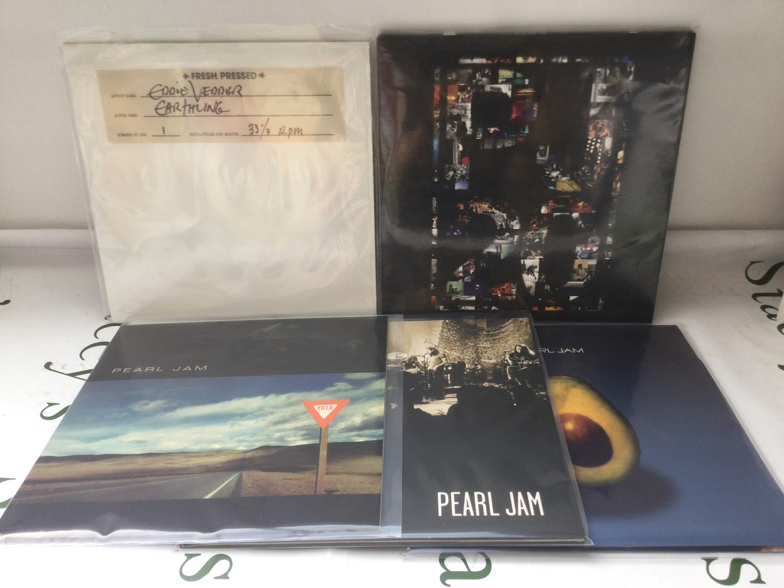 Five Pearl Jam and related LPs comprising 180g pressings of Twenty, MTV Unplugged and others including a white vinyl pressing of Yield.