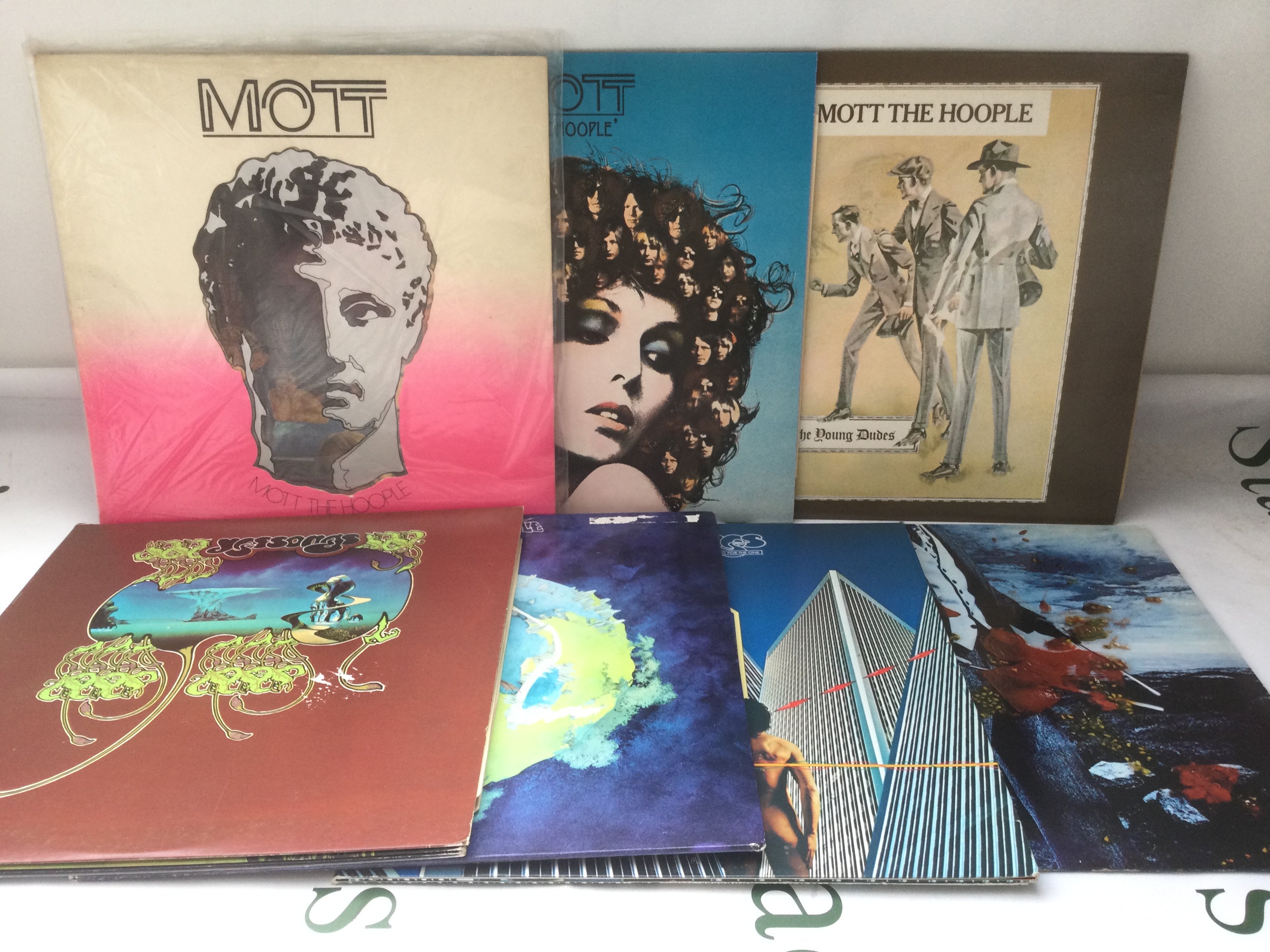Three Mott The Hoople LPs and four by Yes.