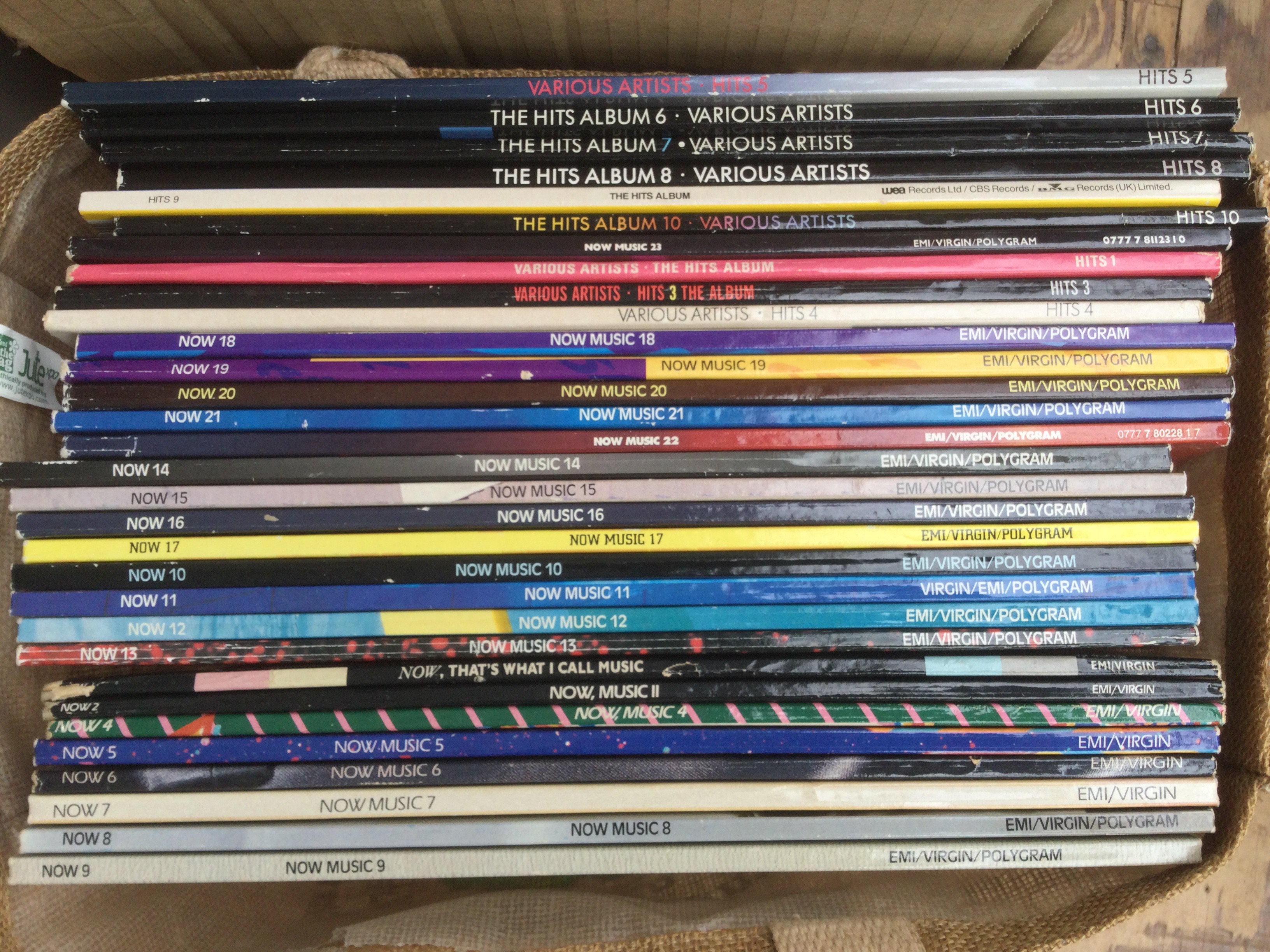 A collection of Now and Hits compilation LPs.