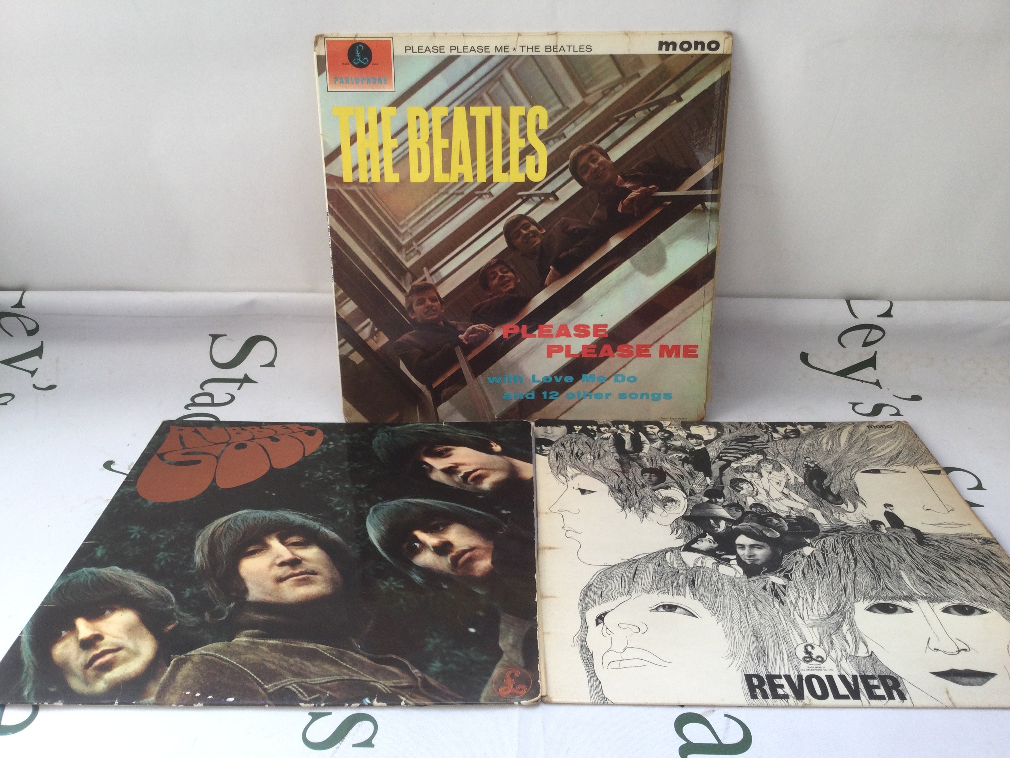 Three early UK mono pressings of Beatles LPs comprising Please Please Me (not black and gold label), Rubber Soul and Revolver.