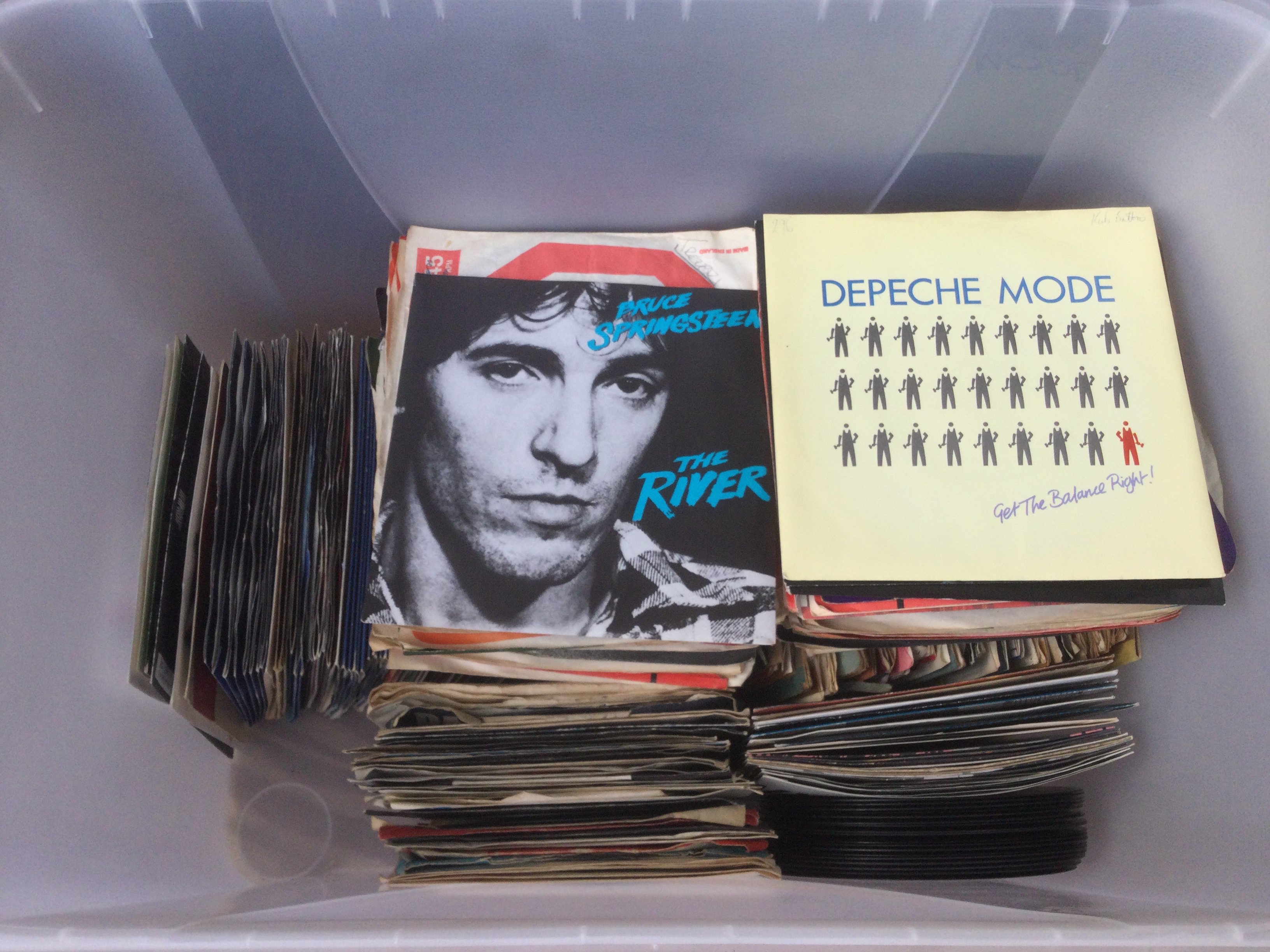 Two boxes of 7" singles an EPs by various artists from the 1960s onwards.