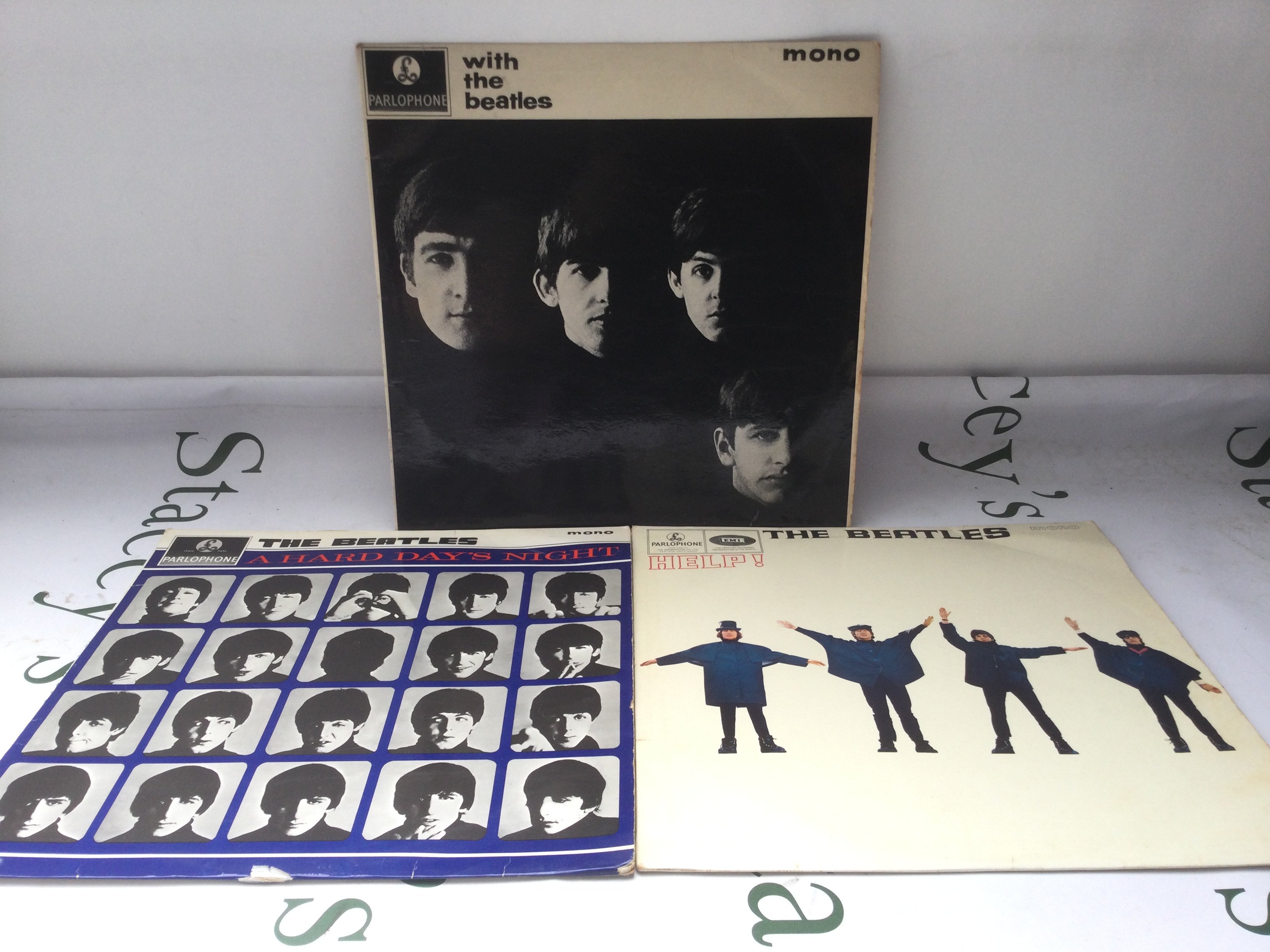 Three early UK mono pressings of Beatles LPs comprising With The Beatles, A Hard Day's Night and Help! All vinyl VG+/Ex.