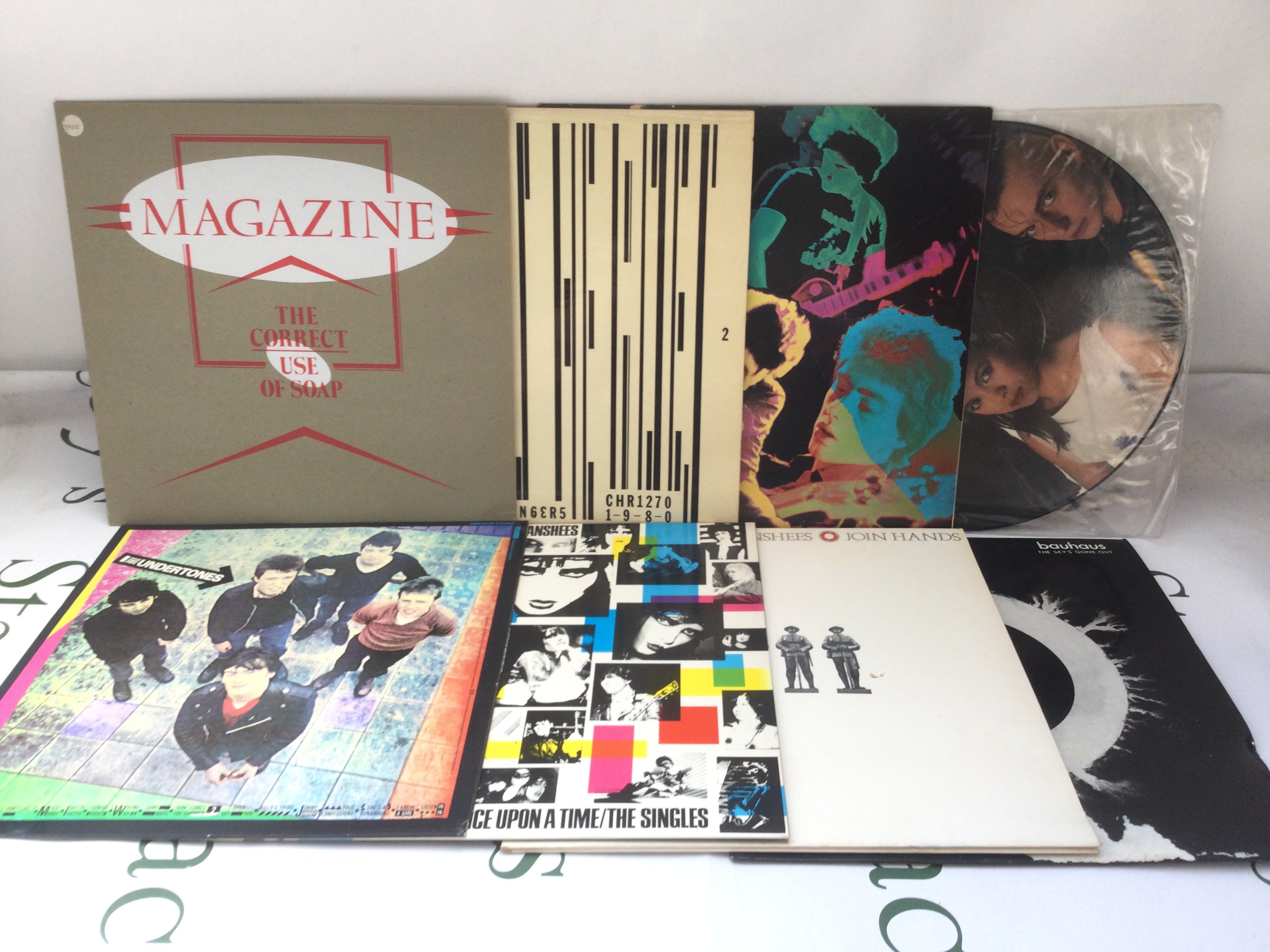 Sixteen punk and post punk LPs by various artists including The Damned, Siouxsie & The Banshees, Magazine and others.