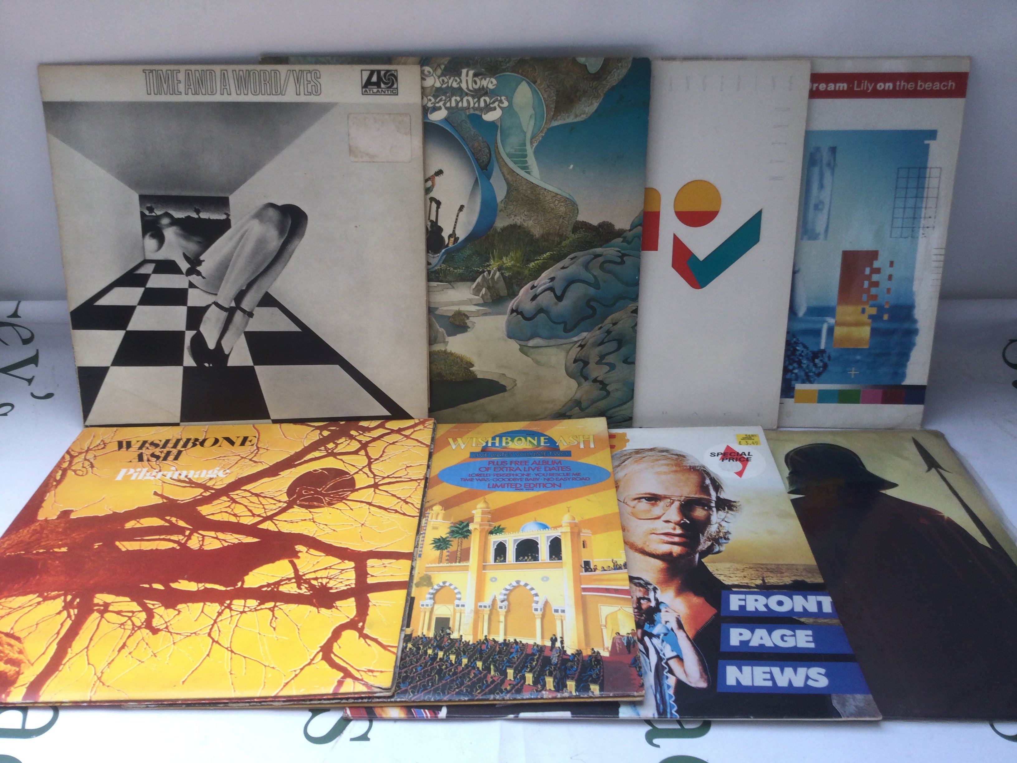 Sixteen prog rock LPs by various artists including Yes, Wishbone Ash, Tangerine Dream and others.
