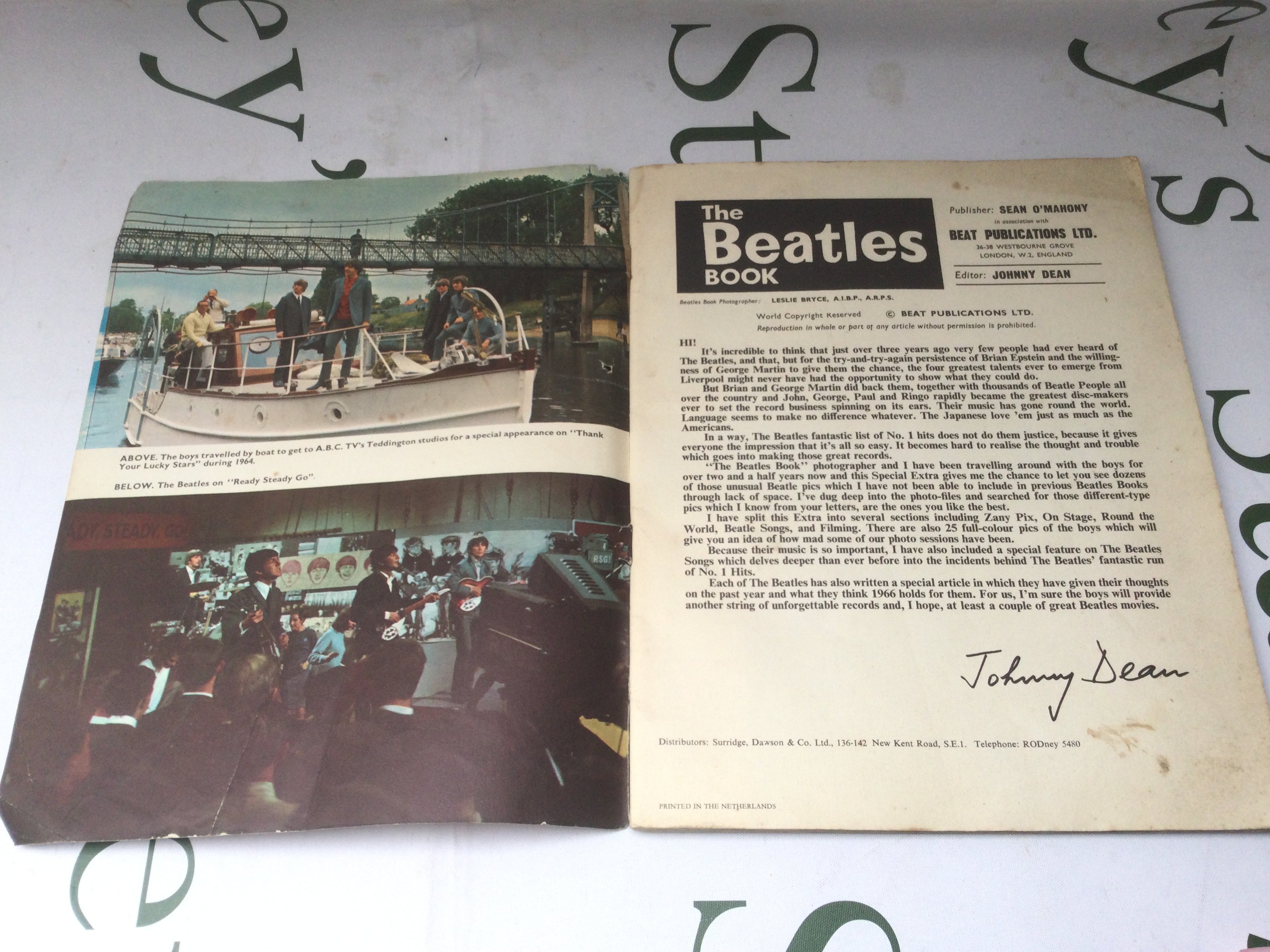 A box of LPs, EPs and 7" singles by various artists including The Beatles, Elvis Presley and others plus a 1965 Beatles book.