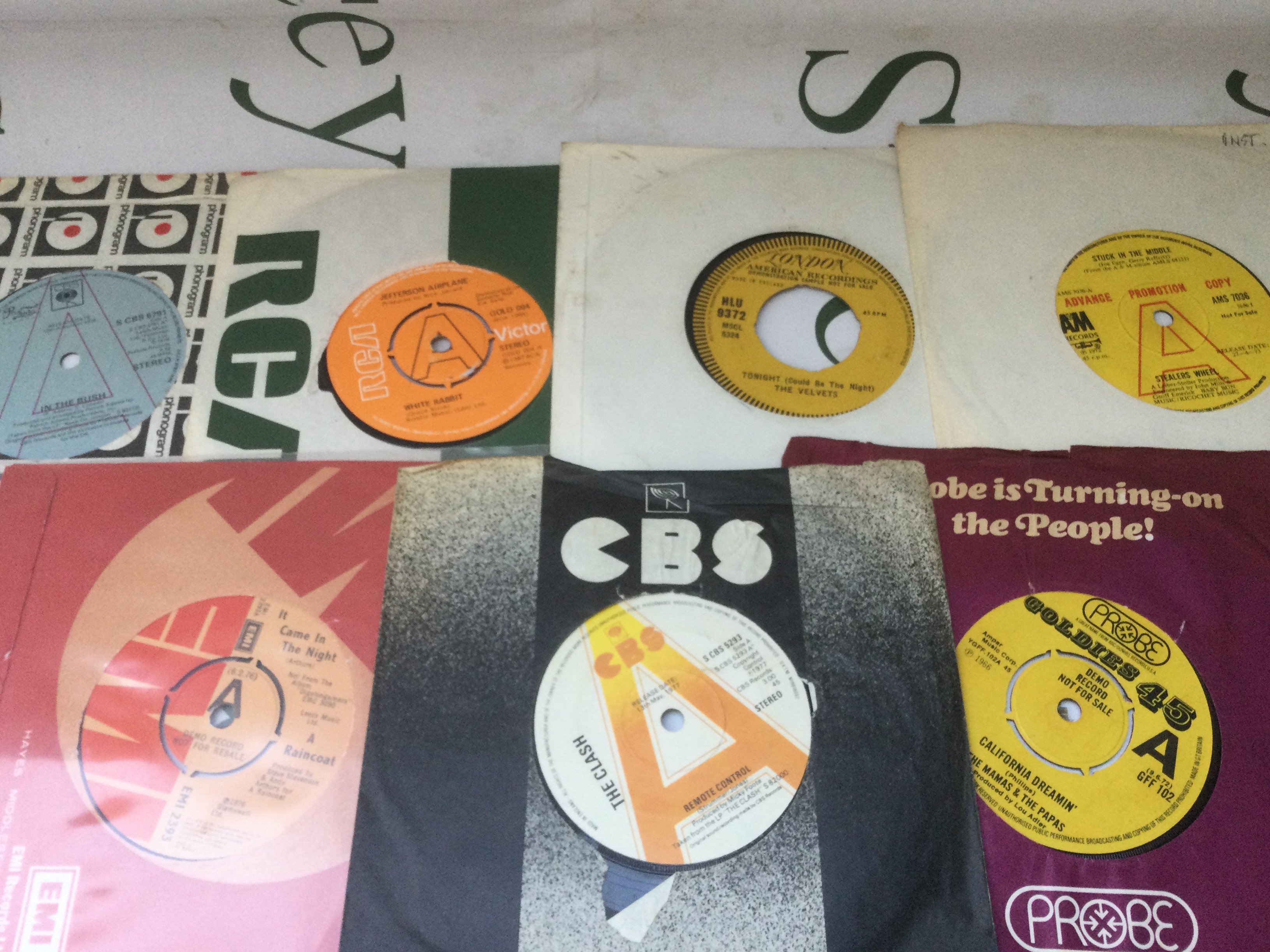 Seven promo singles by various artists including The Clash, Jefferson Airplane and others.