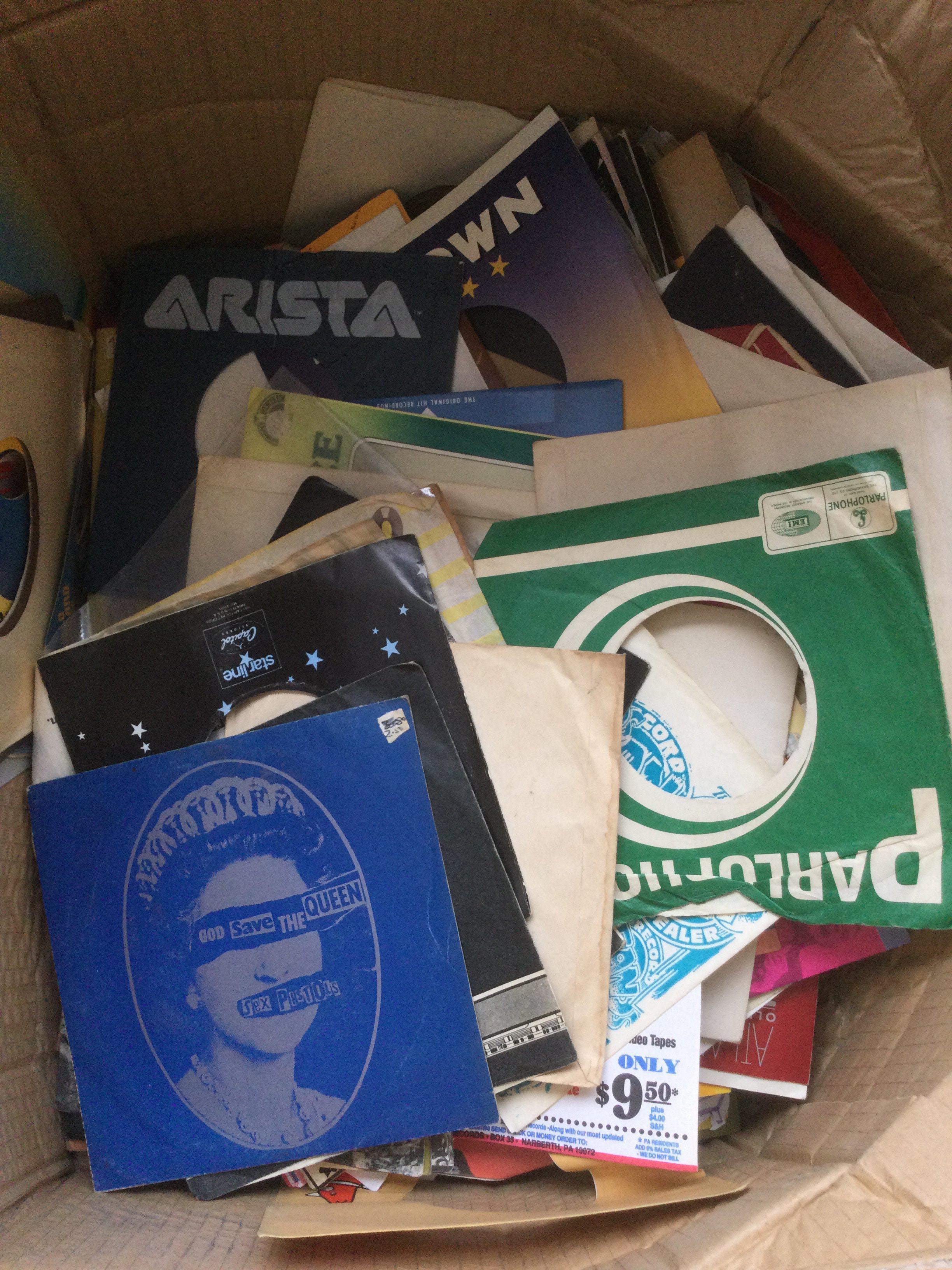 A box of spare 7" single sleeves including some company sleeves.