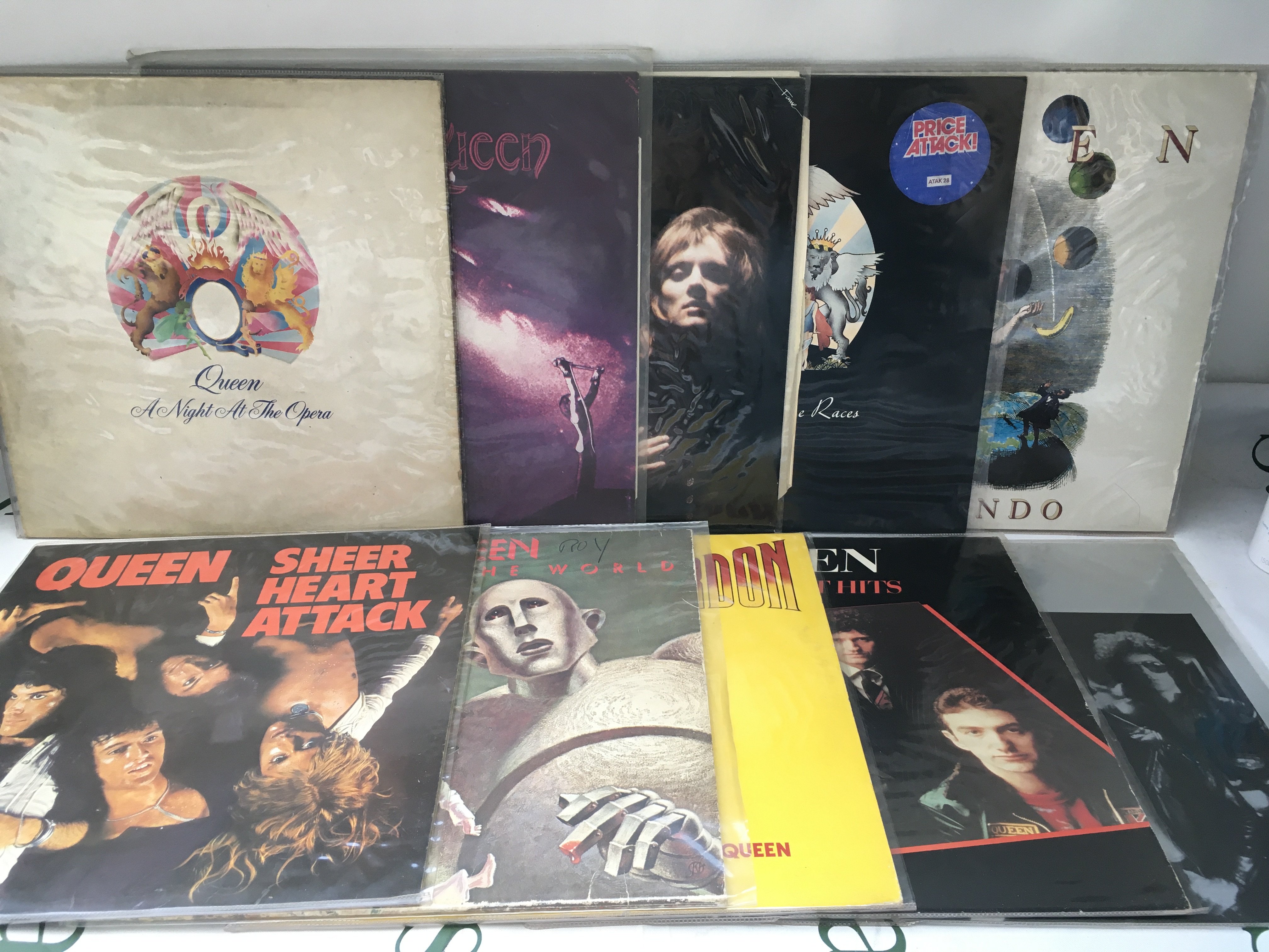 Ten Queen LPs comprising A Day At The Races, Innuendo, Sheer Heart Attack and others.