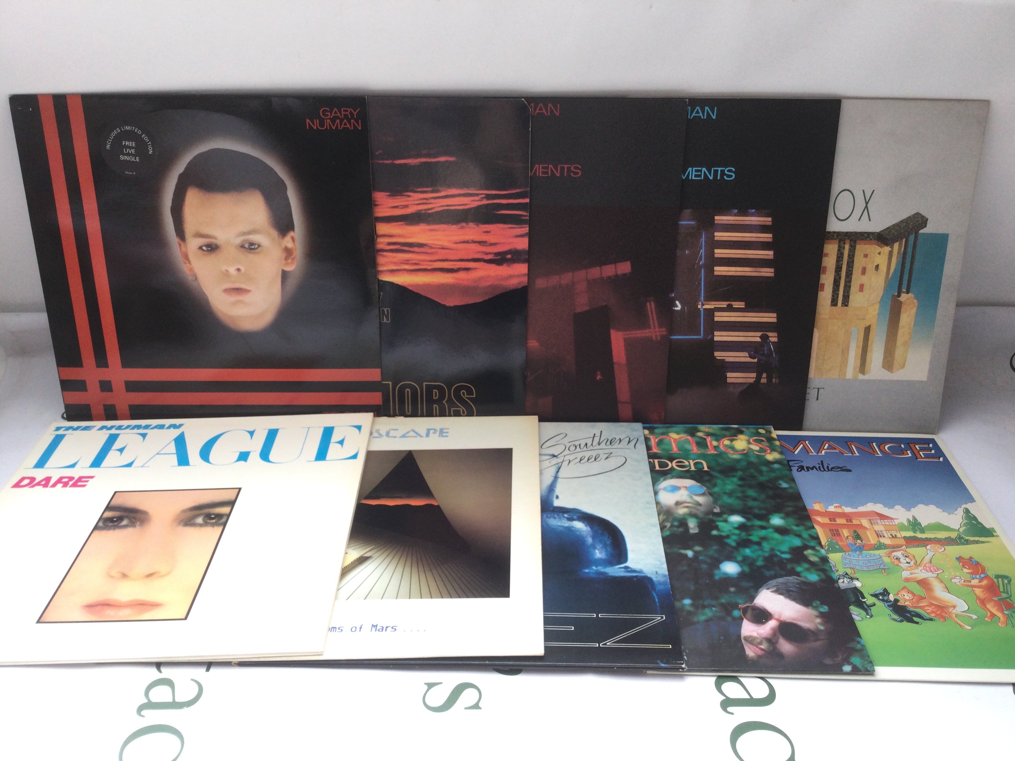 Two bags containing twenty 80s electro synth pop LPs and 12" singles by various artists including Gary Numan, Japan, Depeche Mode and others. Includes an Ultravox promo disc.