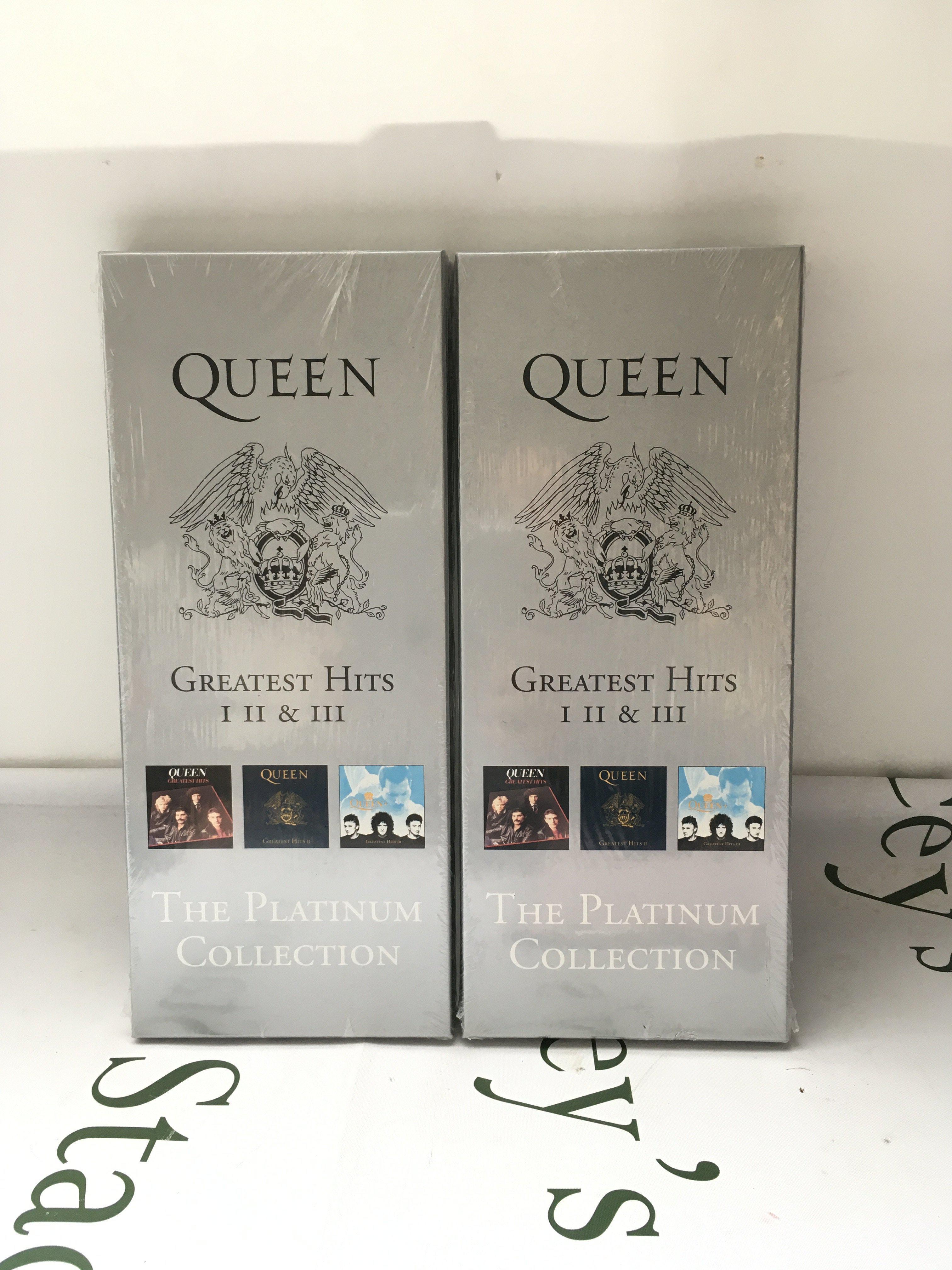 Two sealed Queen Greatest Hits CD long box sets.