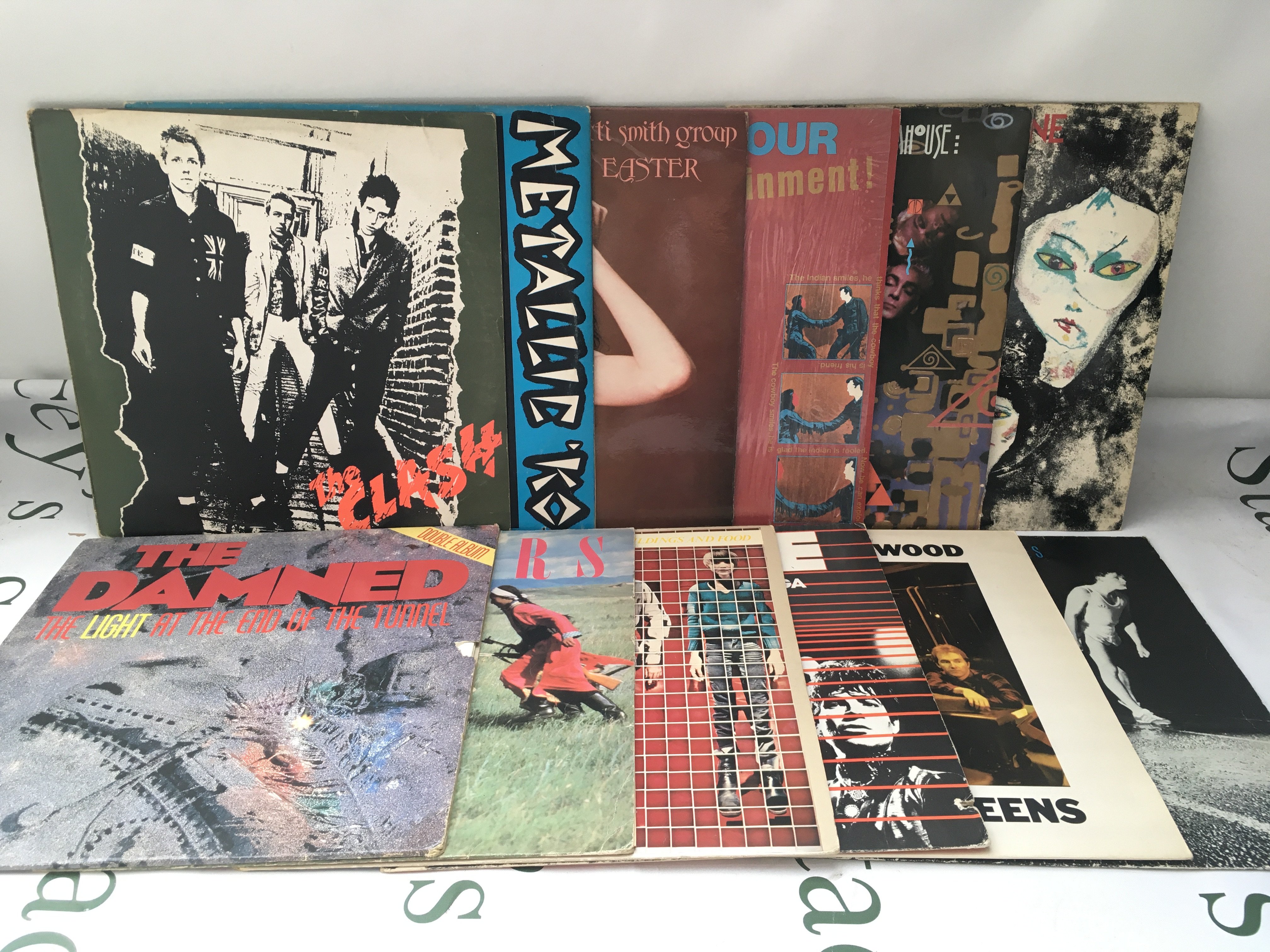 Twelve punk and post punk LPs by various artists including The Clash, Magazine, Gang Of Four and others.