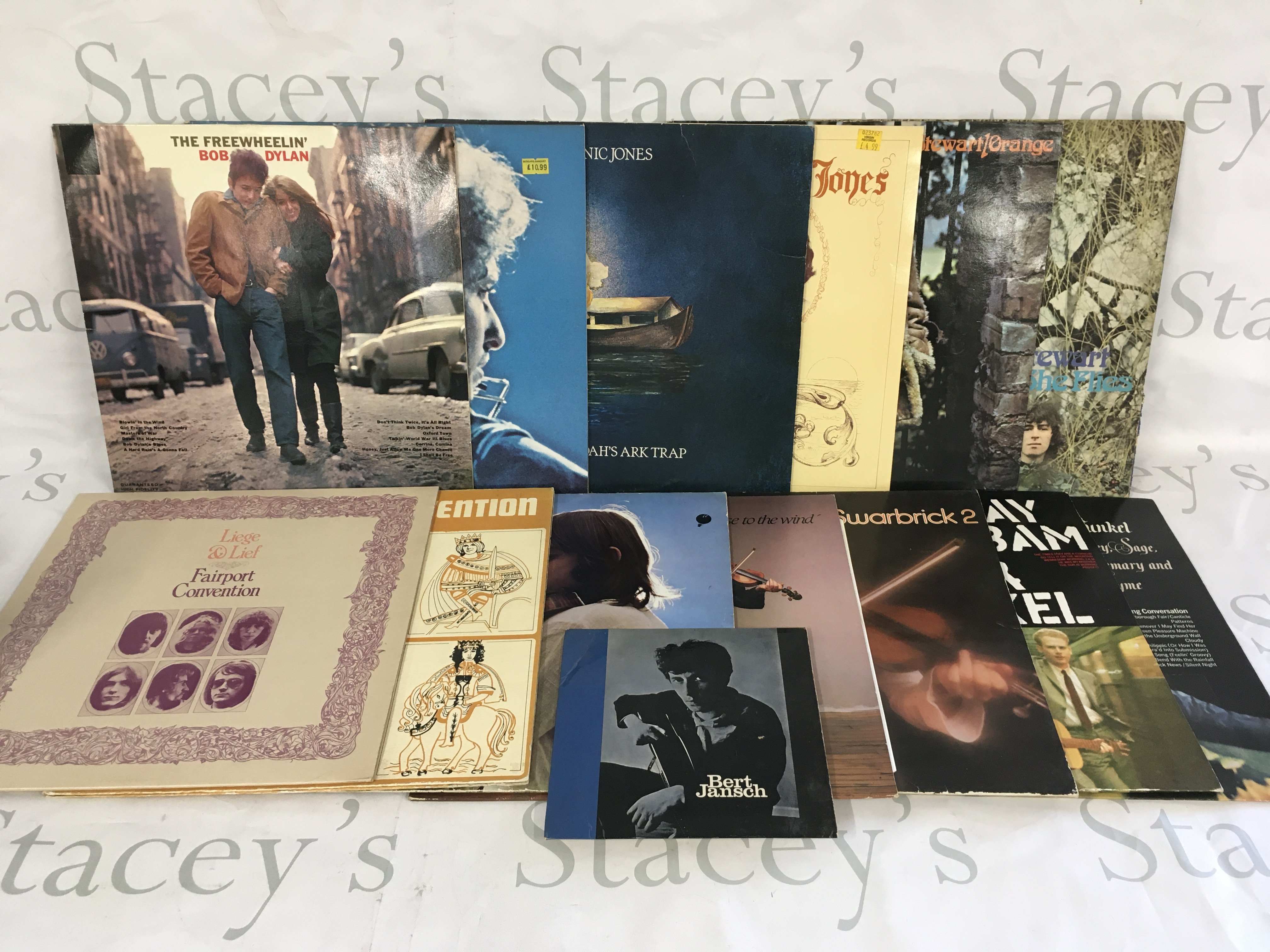 Two bags containing 26 folk rock LPs by various artists including Bob Dylan, Pentangle, Fairport Convention and others plus a Bert Jansch 5 track EP.