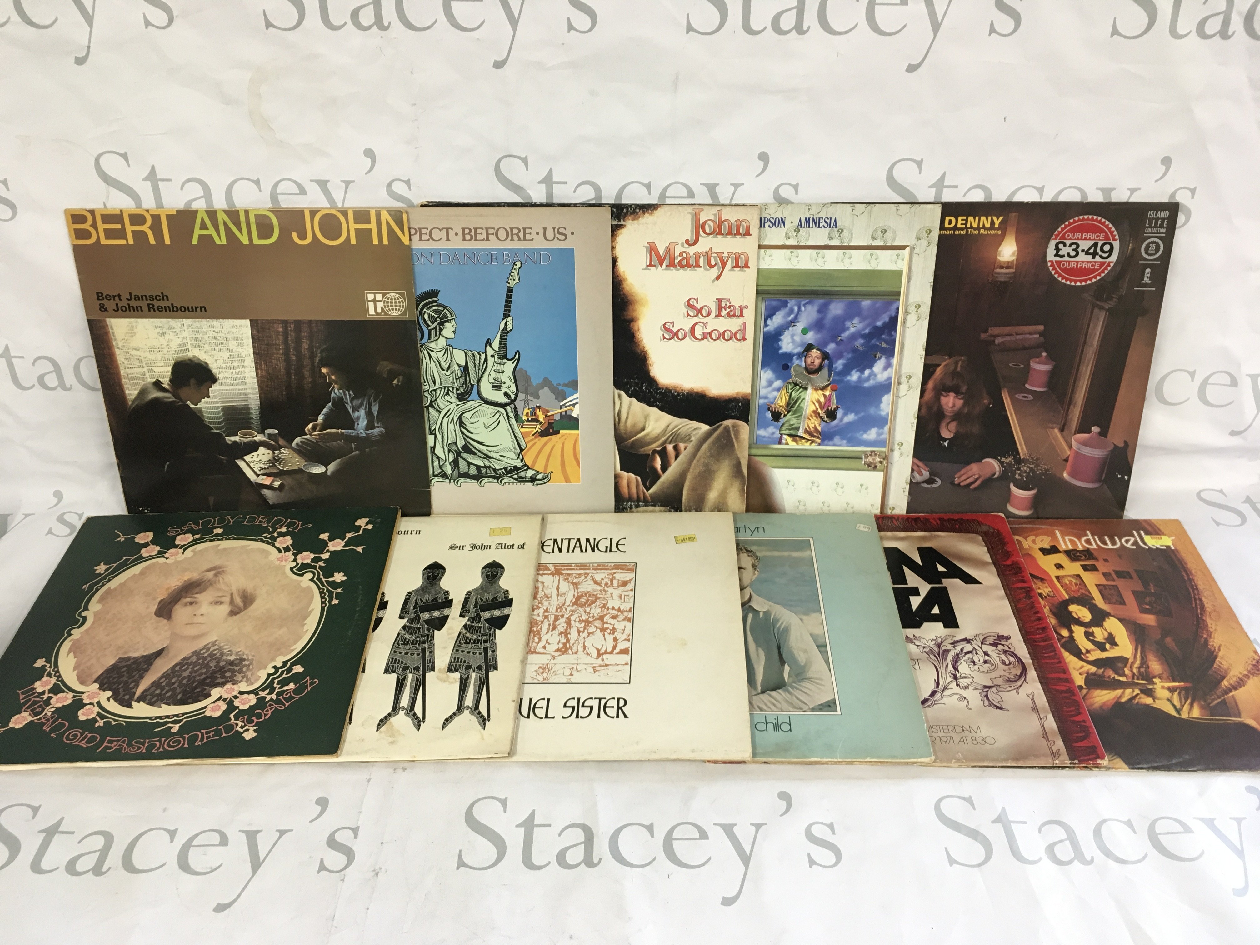 Two bags containing 22 folk rock LPs by various artists including John Martin, Sandy Denny, Richard Thompson and many more.