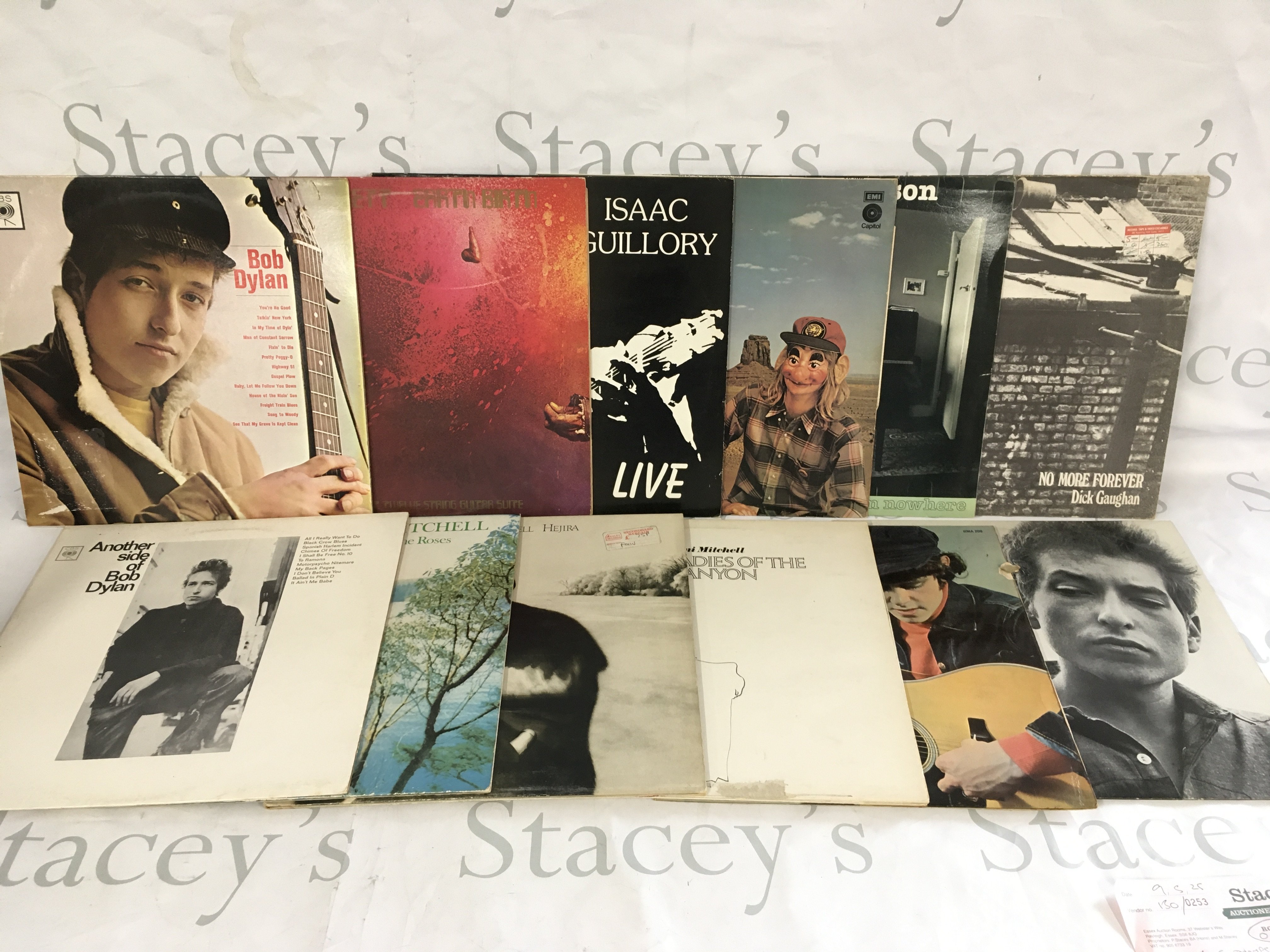 Two bags containing 24 folk rock LPs by various artists including Bob Dylan, Joni Mitchell, Donovan and others.