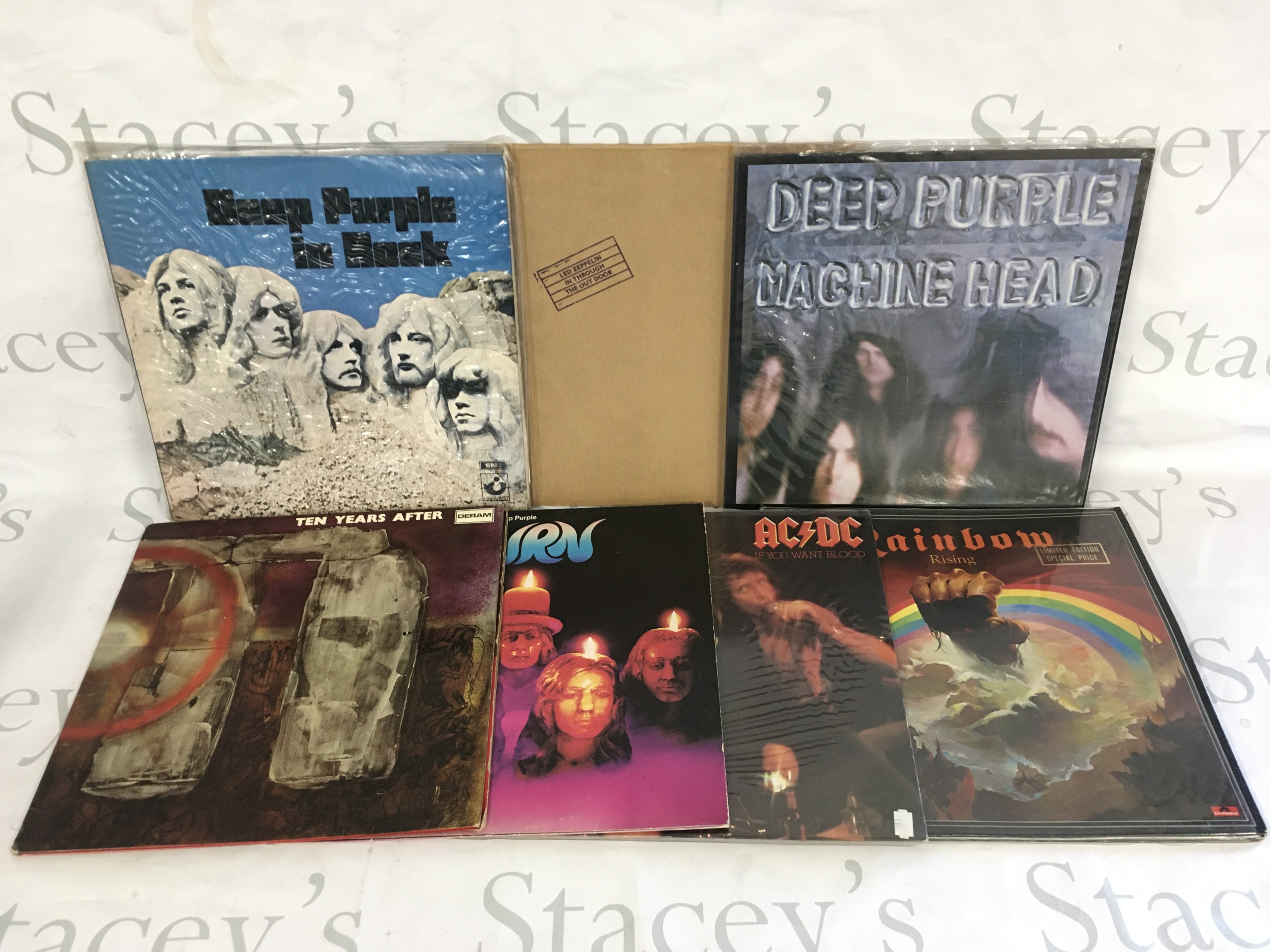 Two bags containing 15 rock LPs by various artists including Led Zeppelin, Deep Purple, Ten Years After and others.
