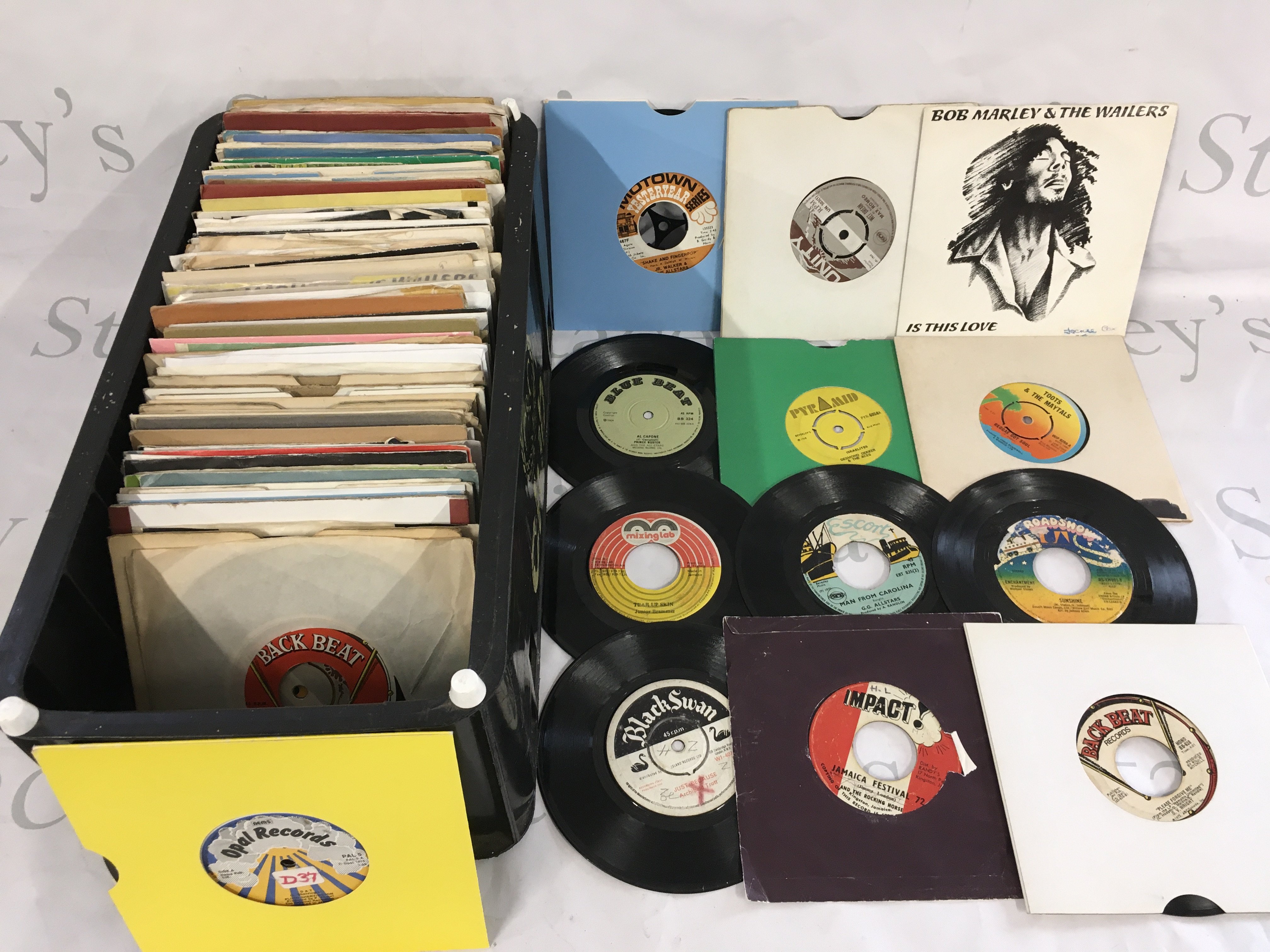 A collection of reggae 7" singles including Jamaican pressings.