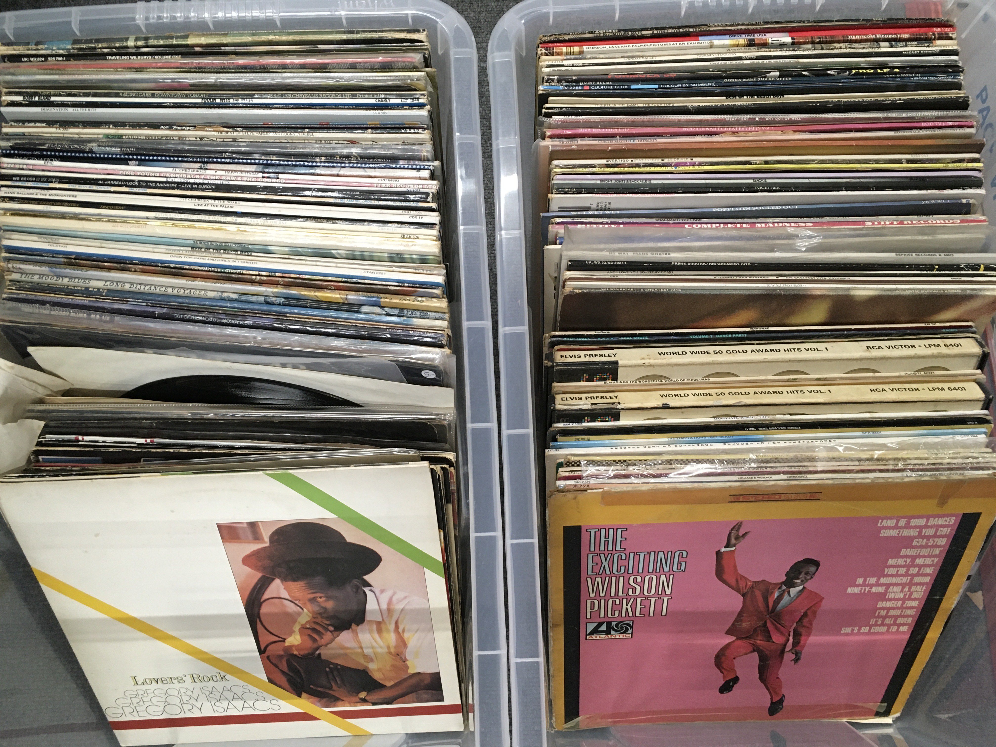 Three boxes of LPs and 12" singles by various artists including The Kinks, Bad Company, Elvis Presley, Wilson Pickett and many more.