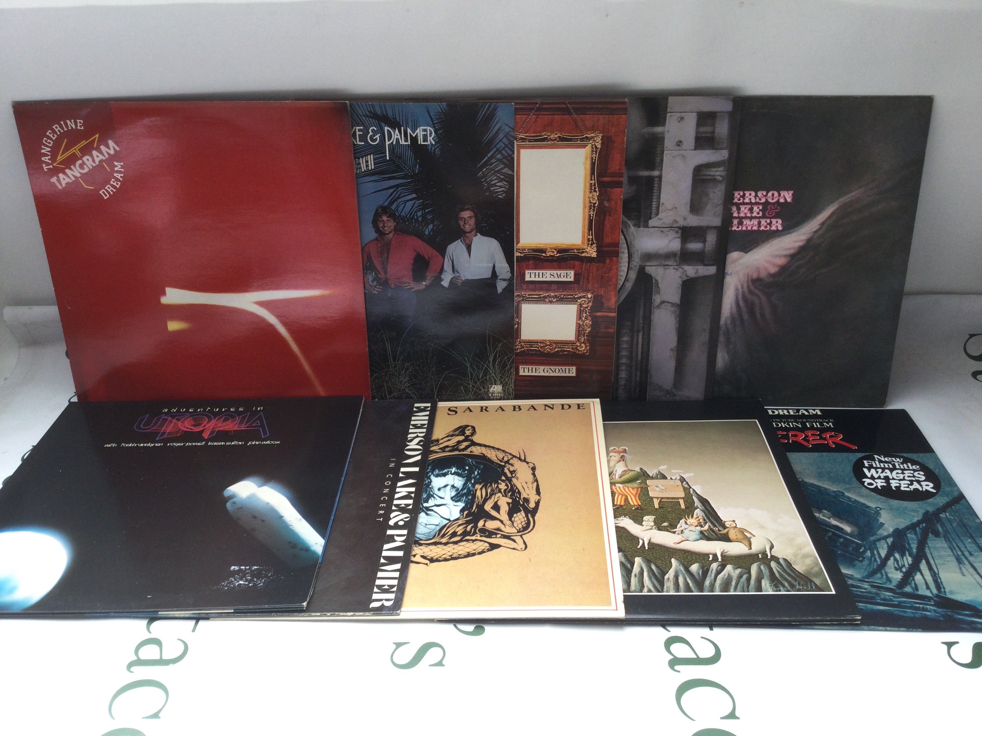 Two bags containing twenty prog rock LPs by various artists including Aphrodite's Child, The Nice, King Crimson and others. Includes two promo discs and US pressings.