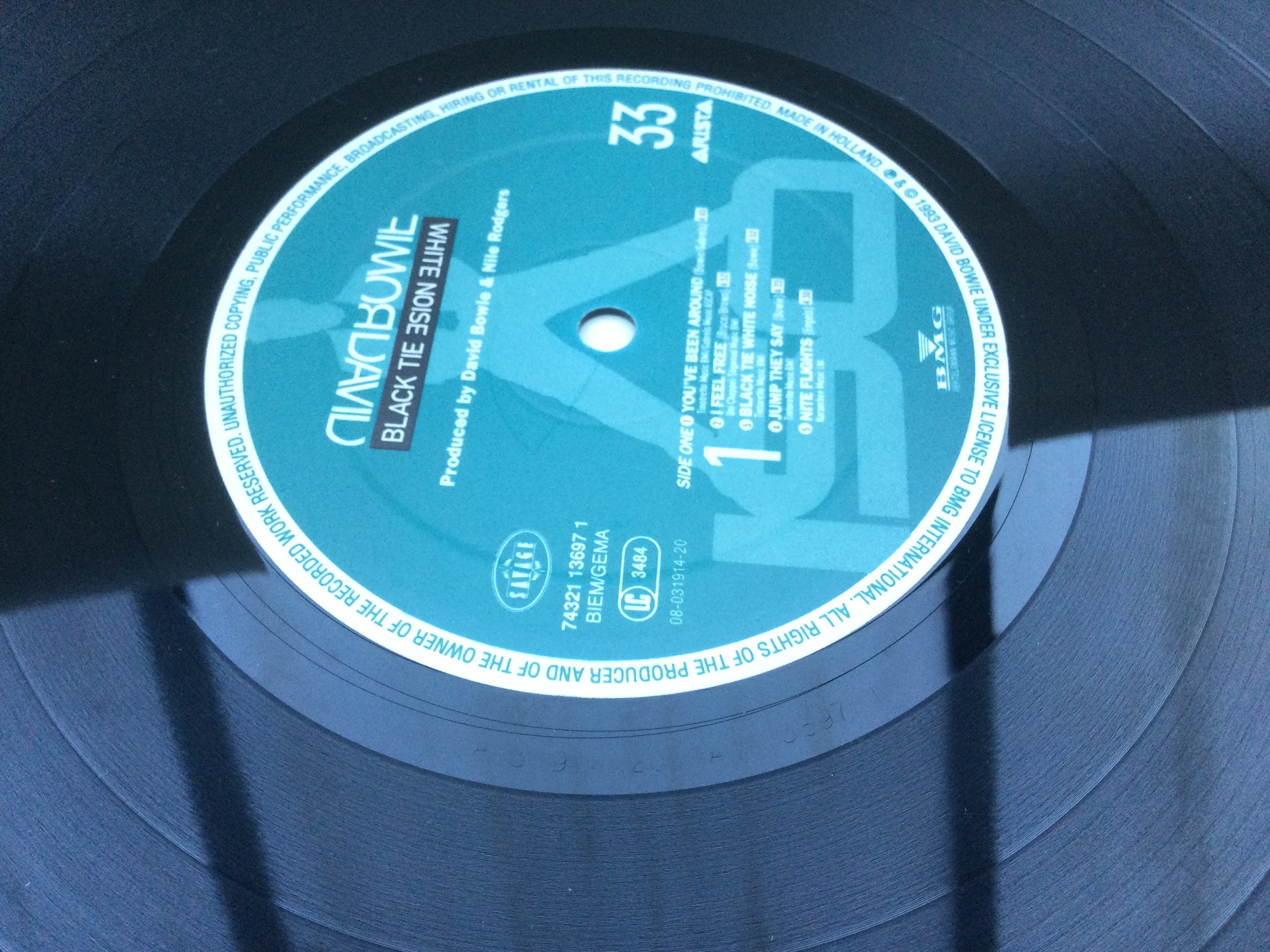 A first UK pressing of the David Bowie LP 'Black Tie White Noise', 74321 13697 1. Sleeve Ex, Vinyl Ex.