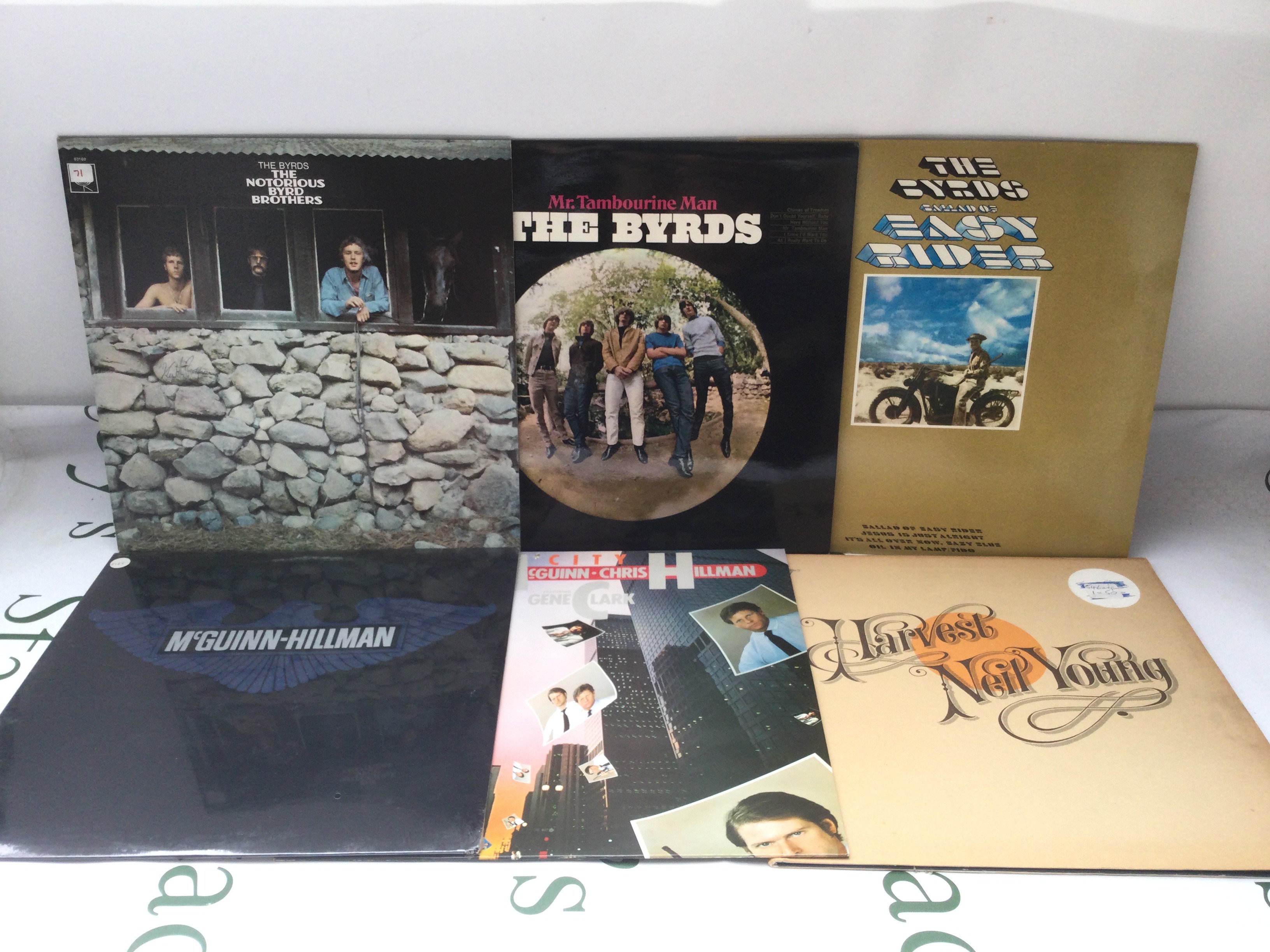 Twelve folk rock LPs by Neil Young, The Byrds and related. Includes a Neil Young promo disc.