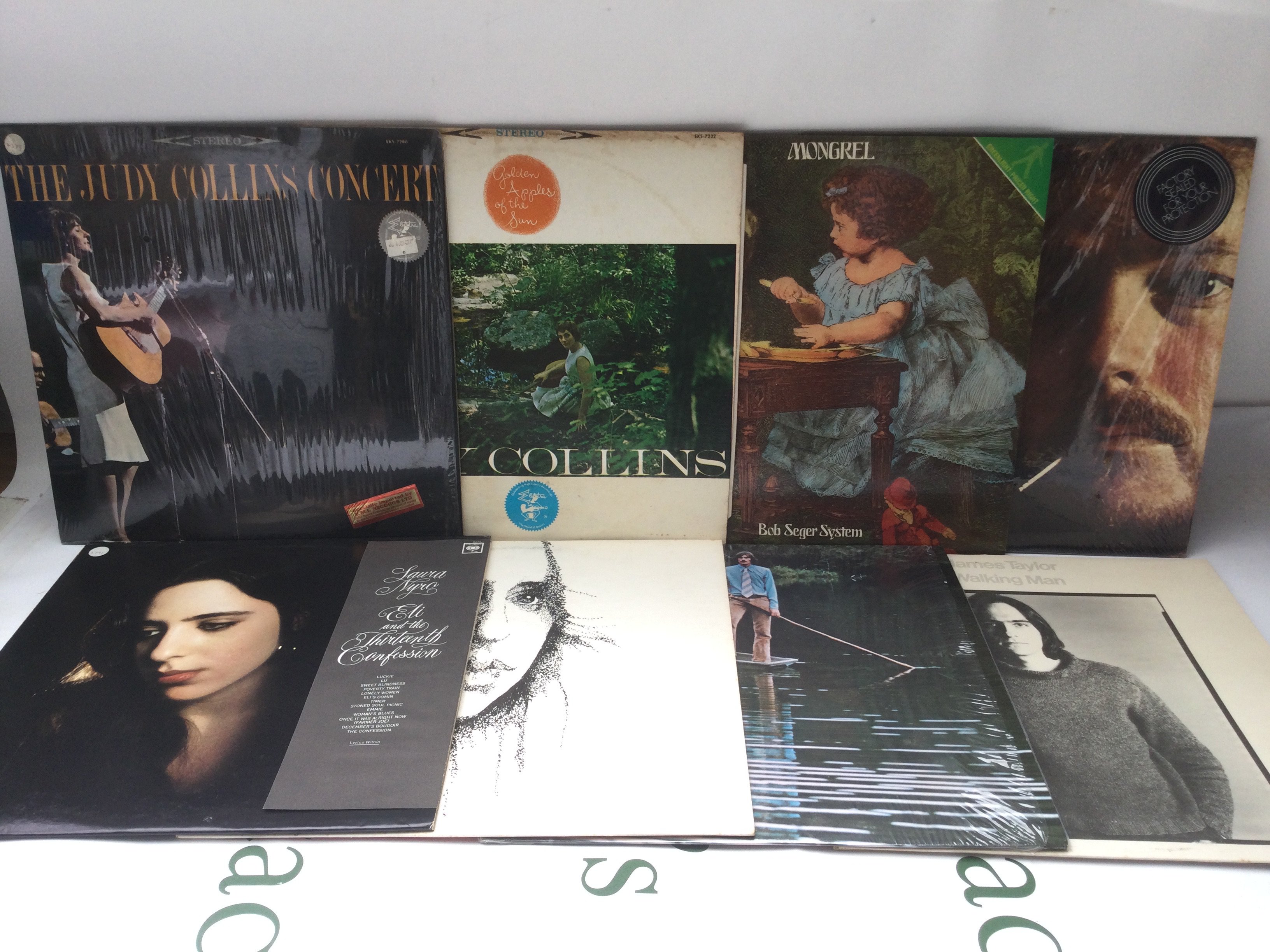 Sixteen folk LPs by various artists including Bob Seger, Judy Collins, James Taylor and others.