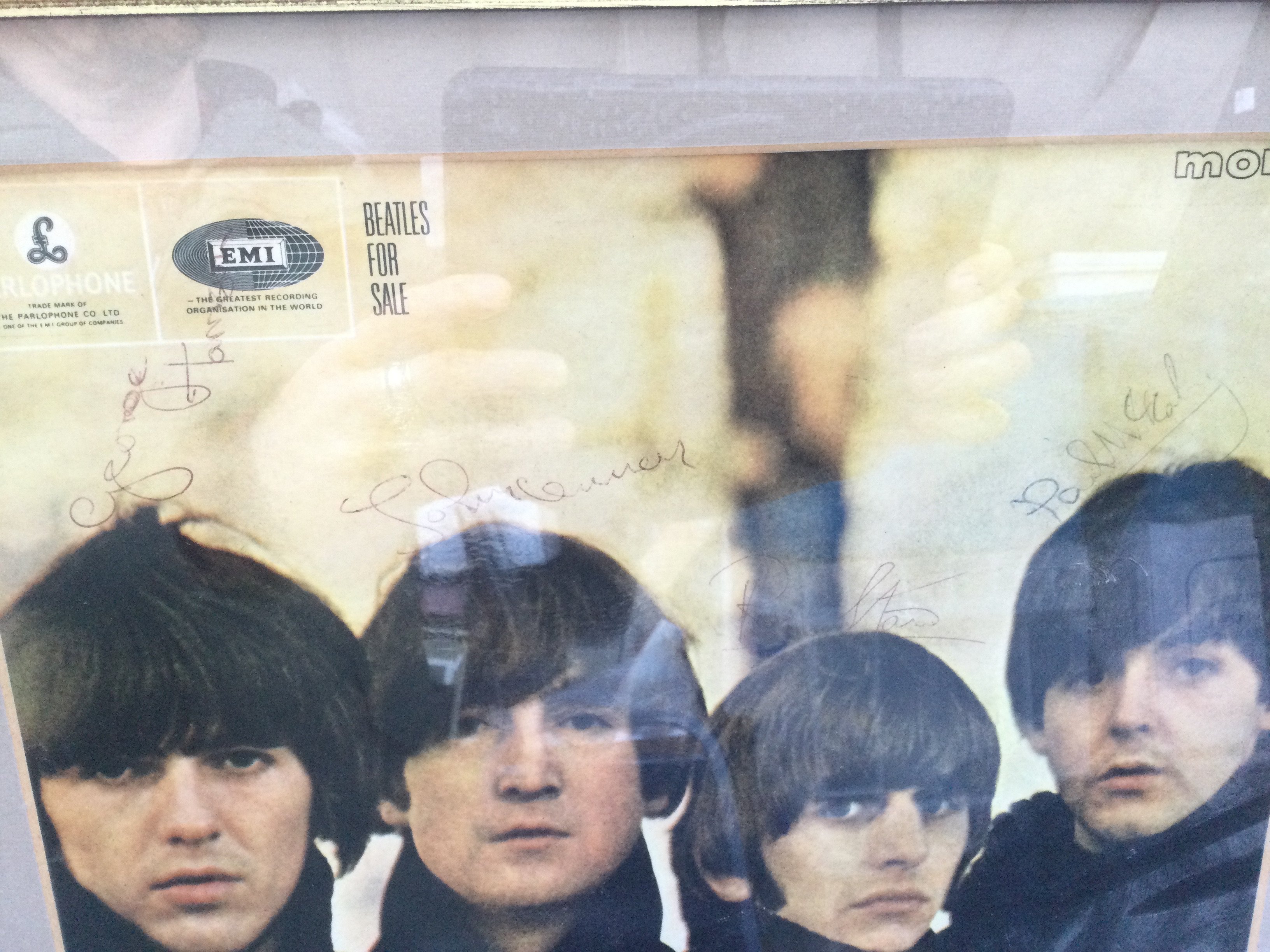 A signed Beatles For Sale LP presented in a framed display. Provenance provided. Please note that we are not experts in this field and can offer no guarantees that these signatures are genuine and will not be held responsible should they prove otherwise.