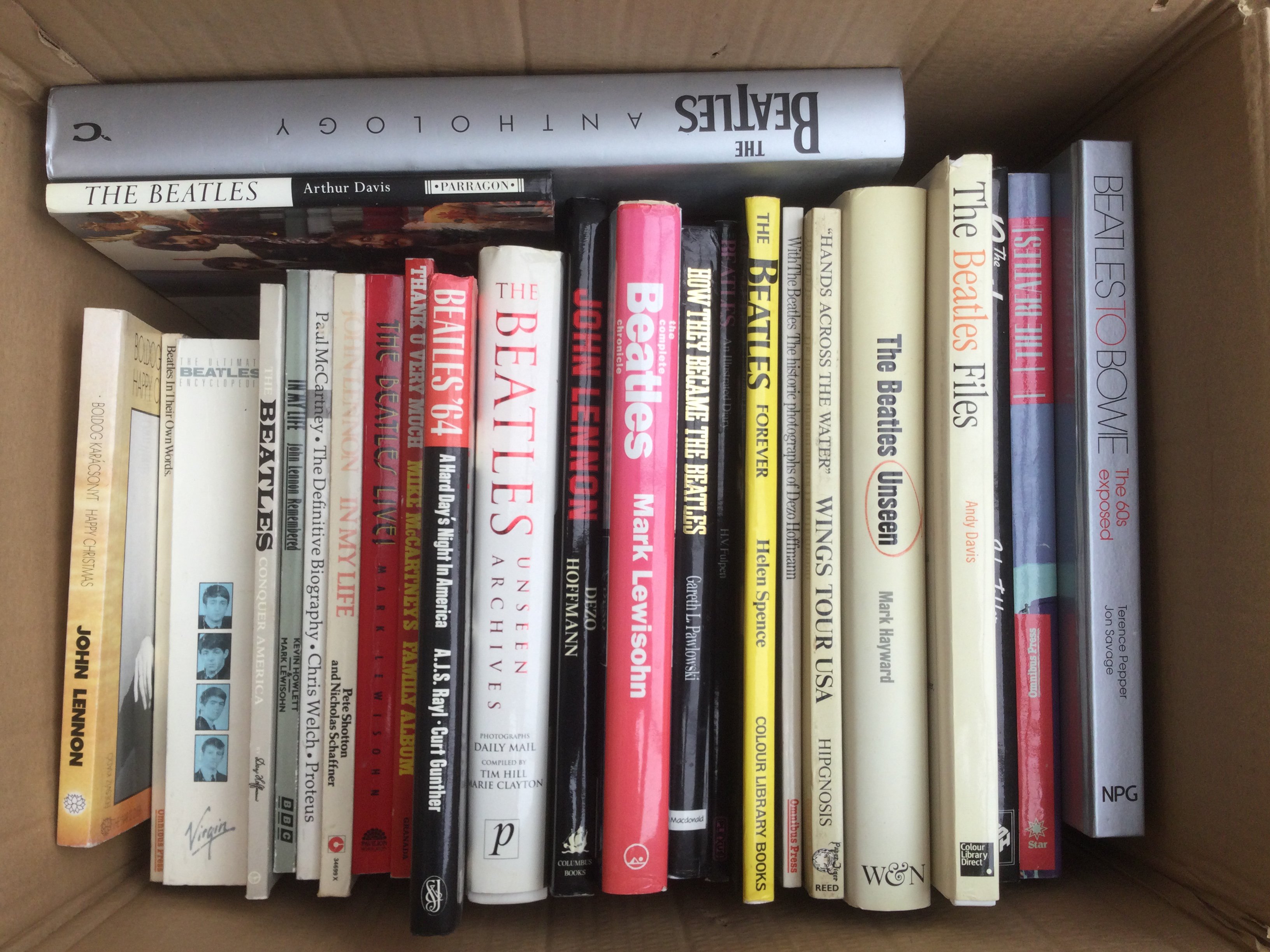 Two boxes of books on The Beatles.