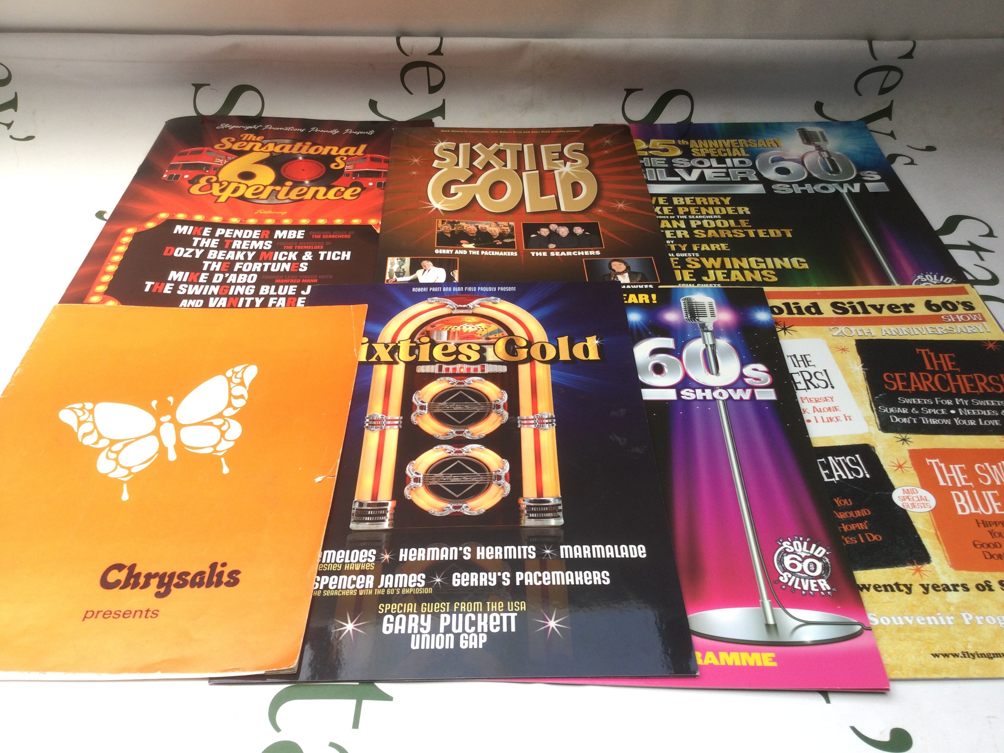 A collection of 1960s artists tour programs, some with tickets, including a signed Manfred Mann example.