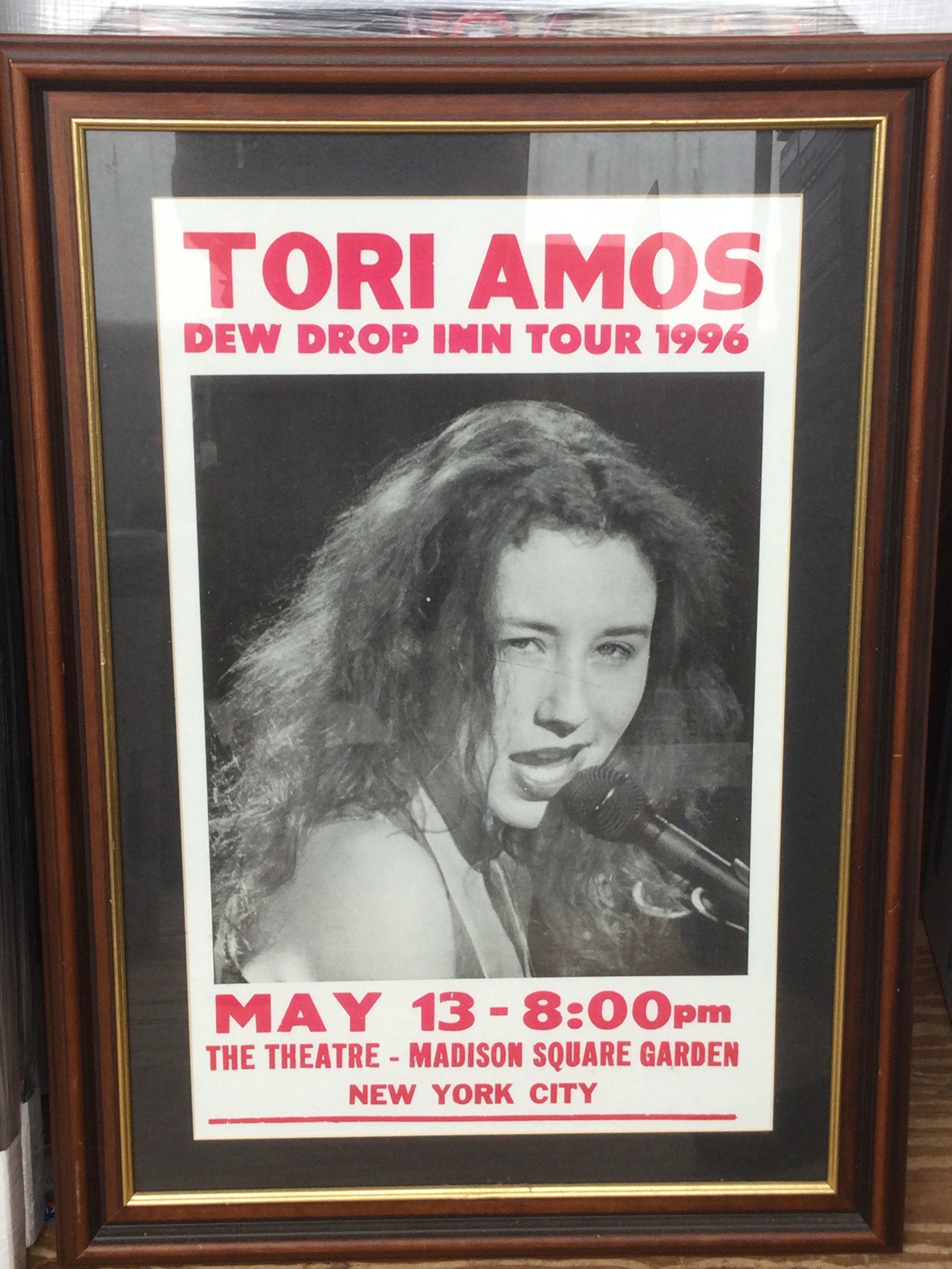 A framed and glazed reproduction Tori Amos concert poster for a 1996 performance at Madison Square Garden, New York, approx 71.5cm x 51cm.