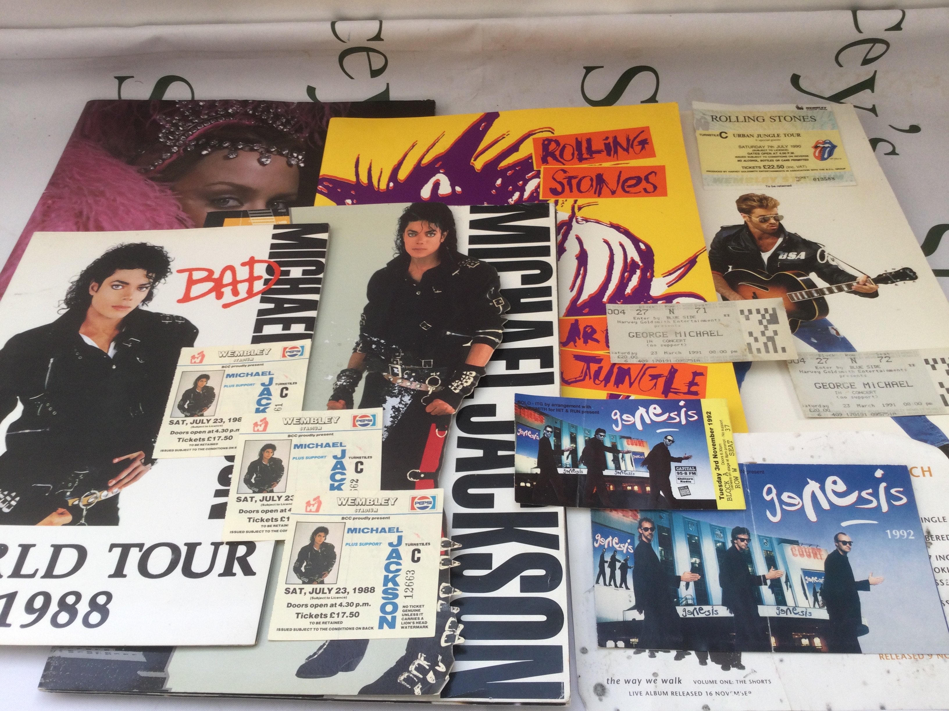 A collection of music programs and tickets plus Aha and Neil Diamond autographs.