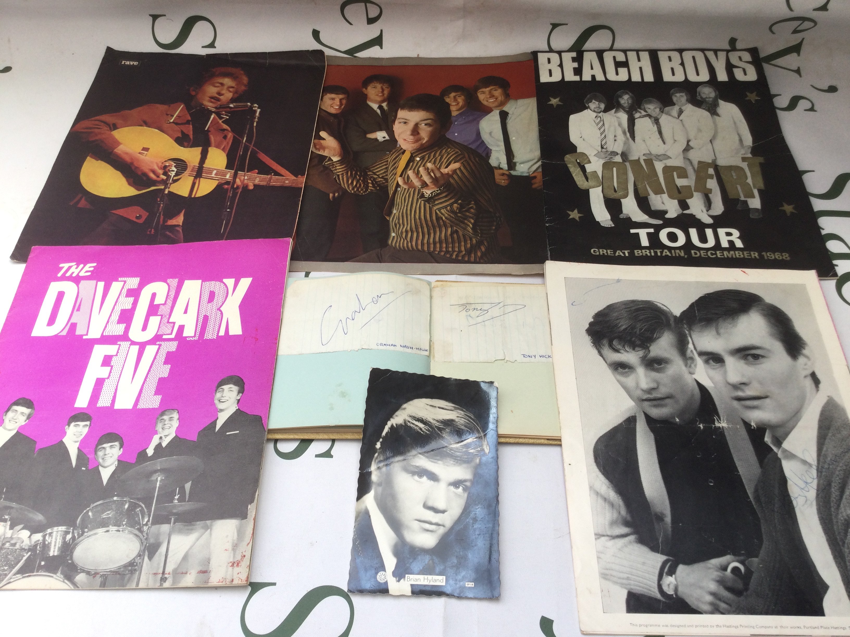 A small collection of 1960s autographs and music programs comprising the signatures of Graham Nash, Tony Hicks, Jet Harris and Tony Meehan.