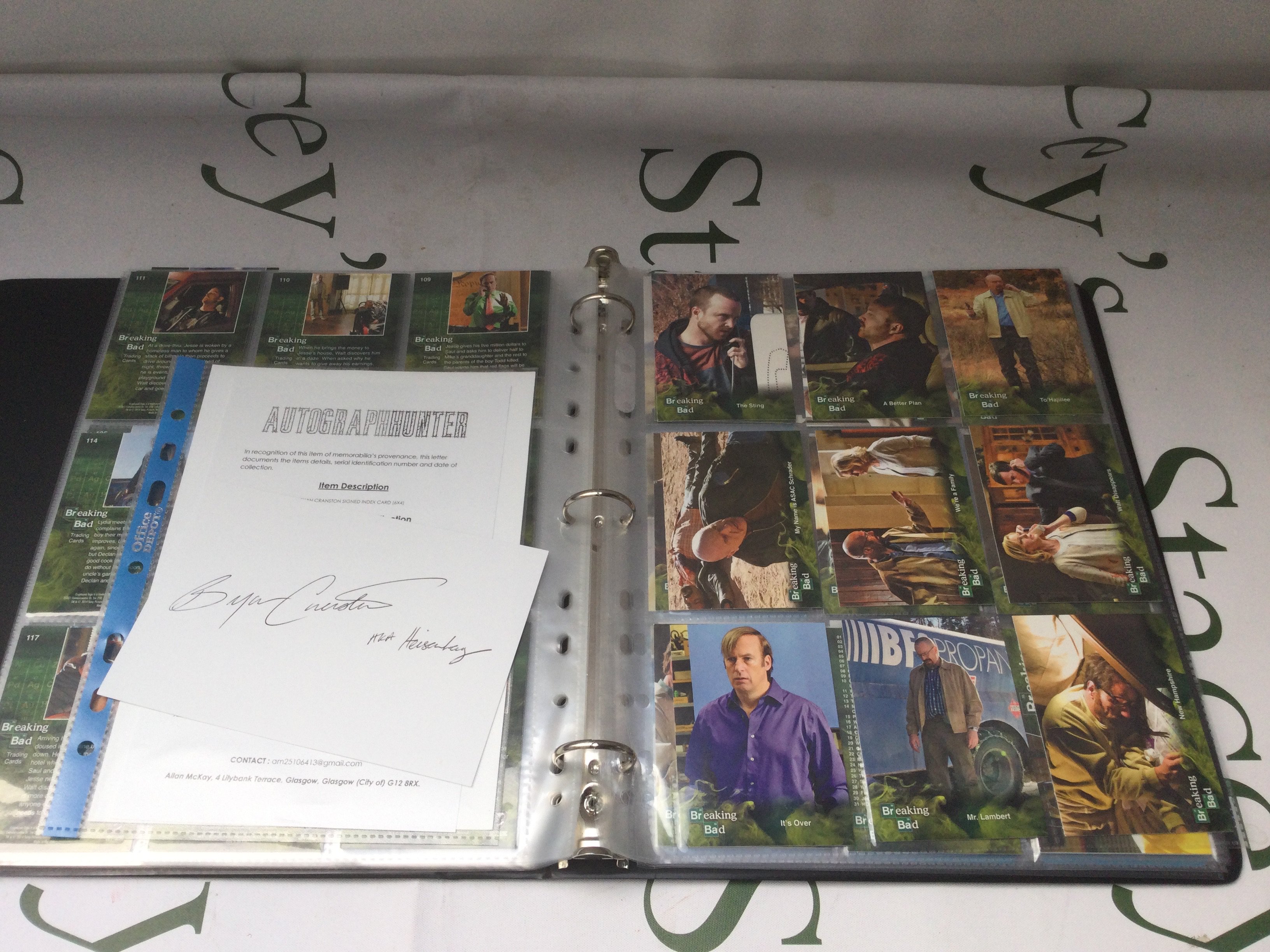 A binder of mainly Breaking Bad trading cards plus a Bryan Cranston autograph with COA.