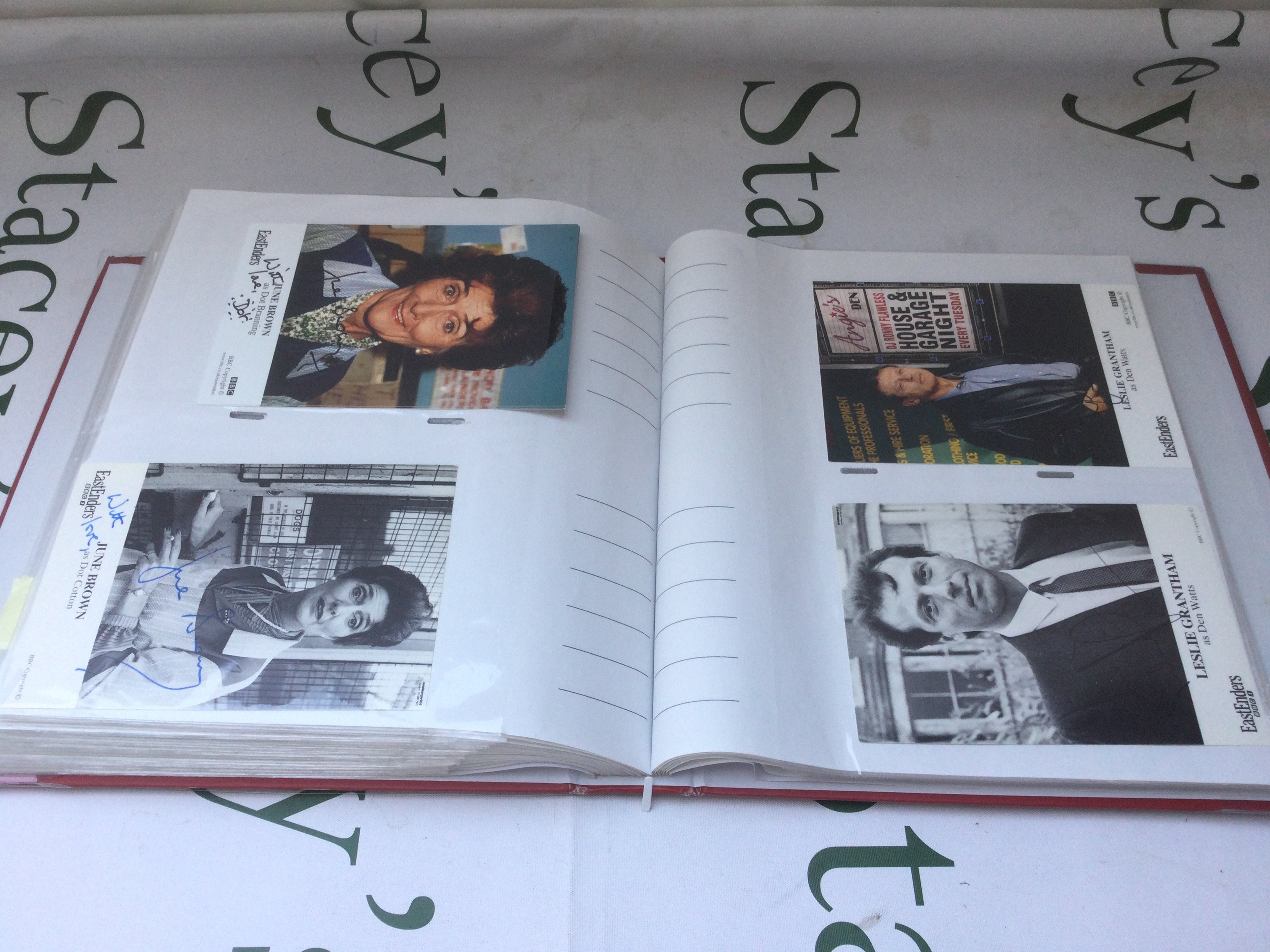 A binder of Eastenders cast autographs including Lesley Grantham, Bill Treacher, Wendy Richard, Shane Richie and many more.