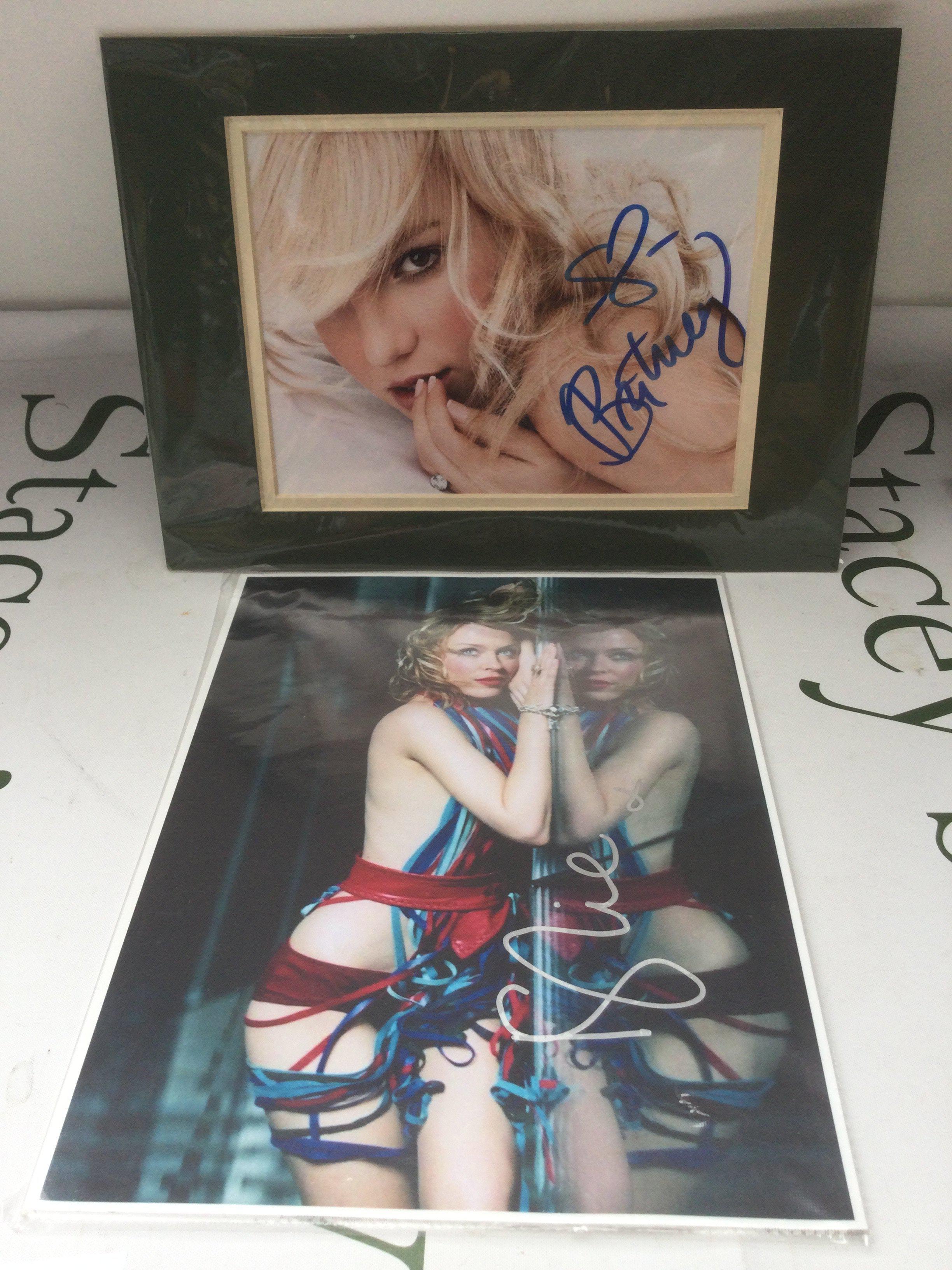A signed photo of Britney Spears and one of Kylie Minogue, both with COAs.