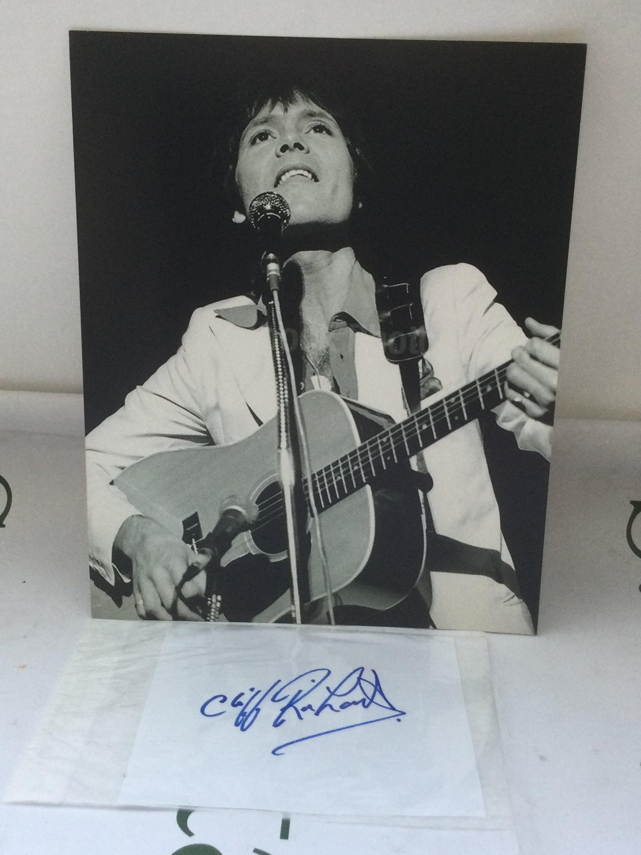 A Cliff Richard autograph and photo with COA.