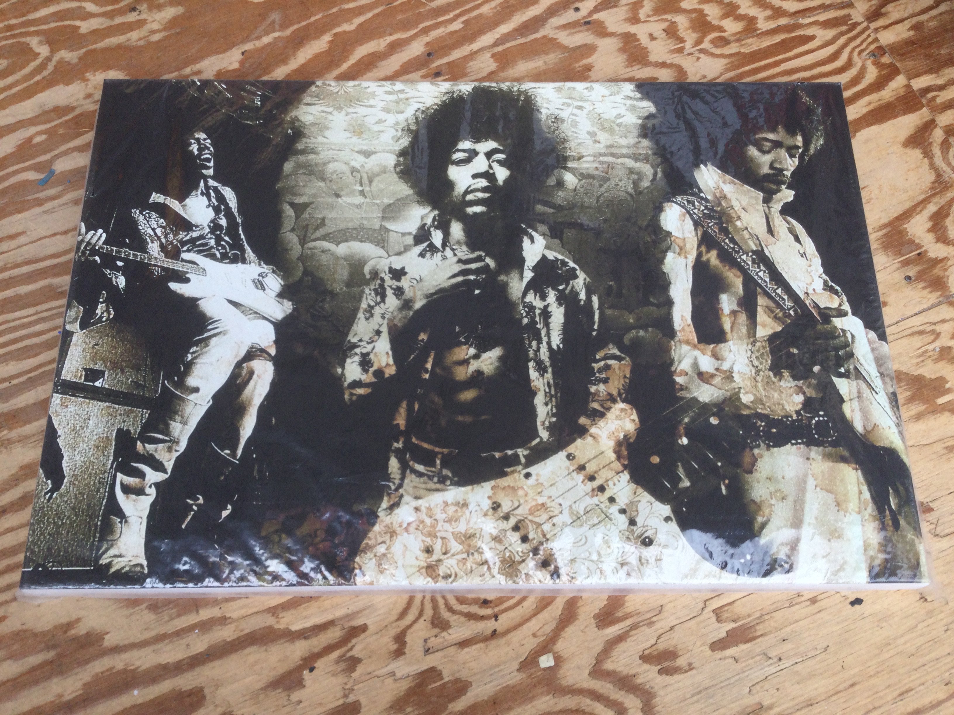 A Jimi Hendrix canvas print, approx 51cm x 76cm plus an oil on board of Jimi (2).