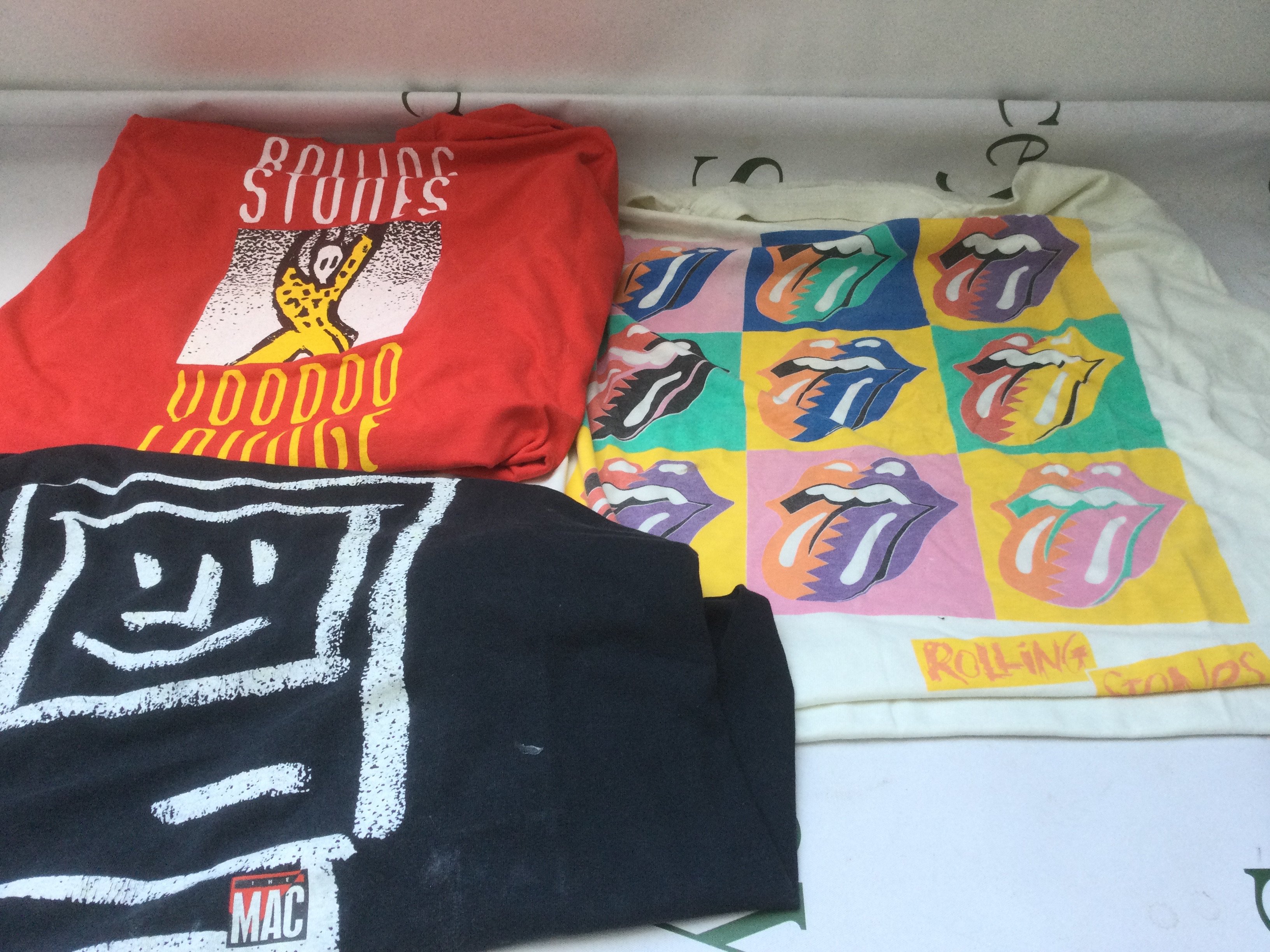 Two vintage Rolling Stones tour t shirts, both XL, plus one other.