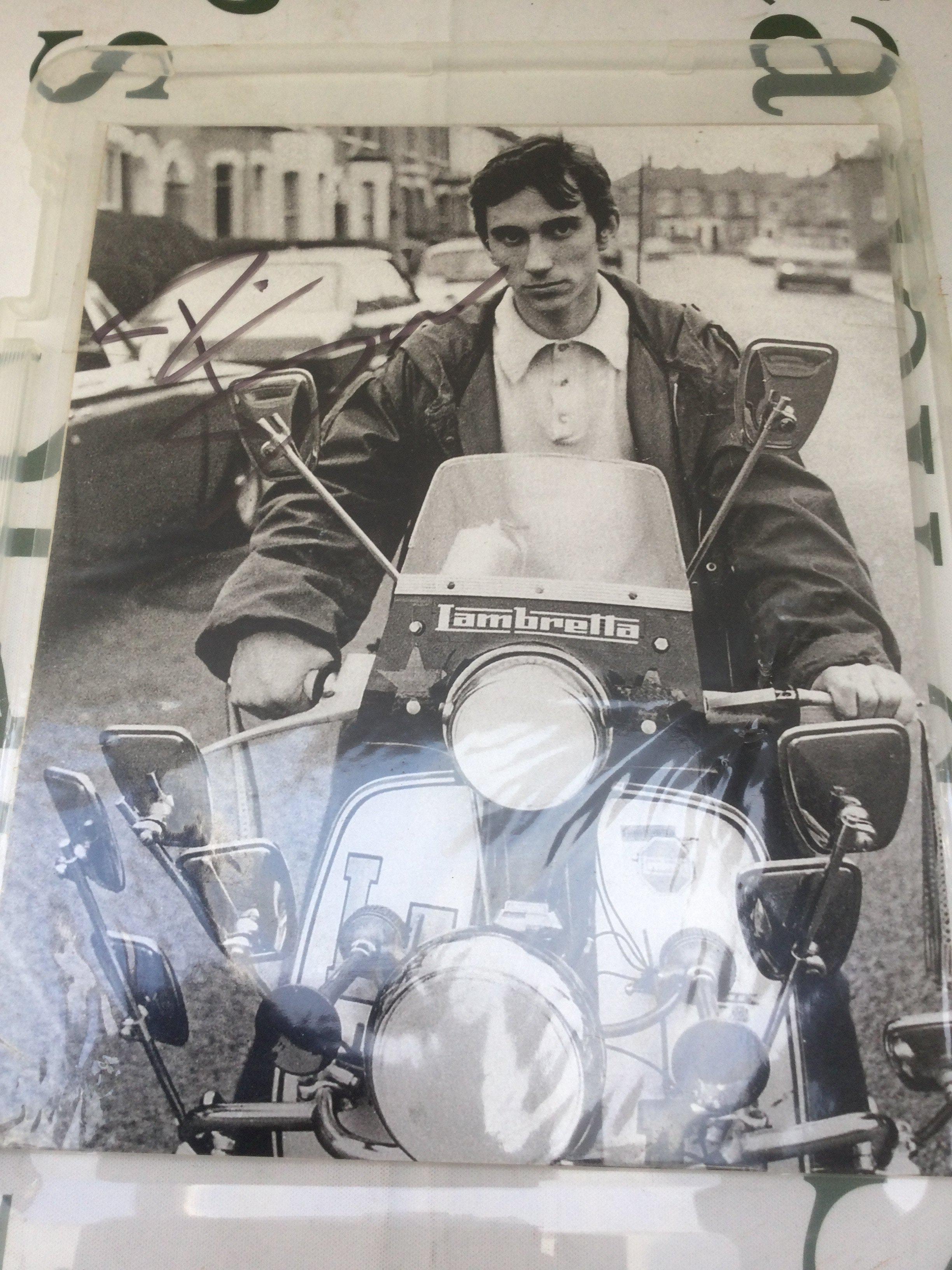 A Phil Daniels signed photo. No COA.