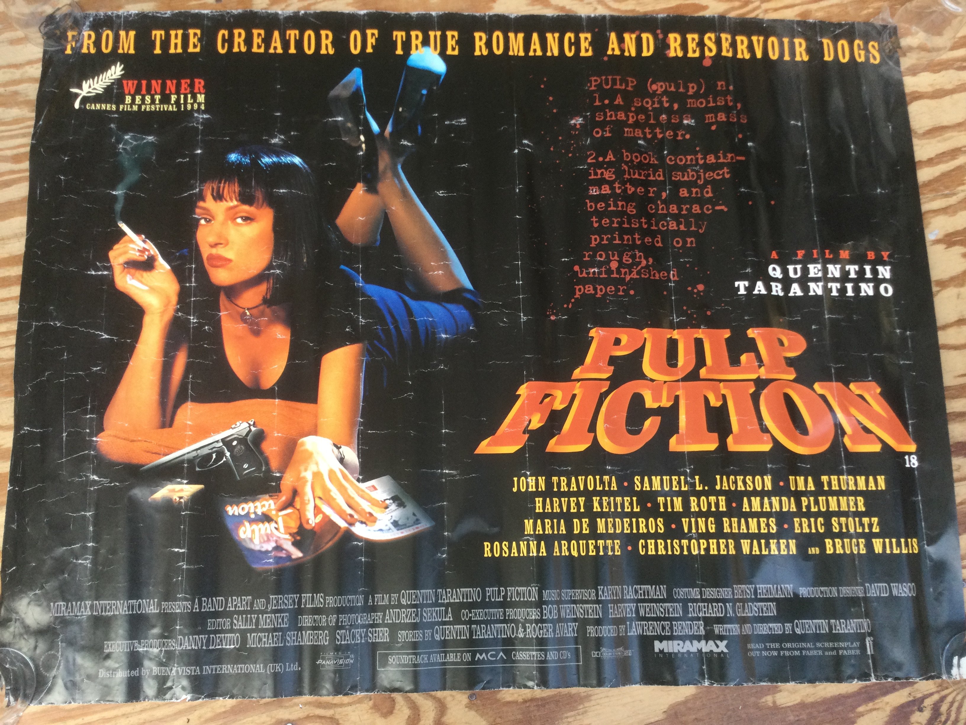 A collection of film posters including Pulp Fiction, a signed Superman Returns, a Thunderball reprint etc.