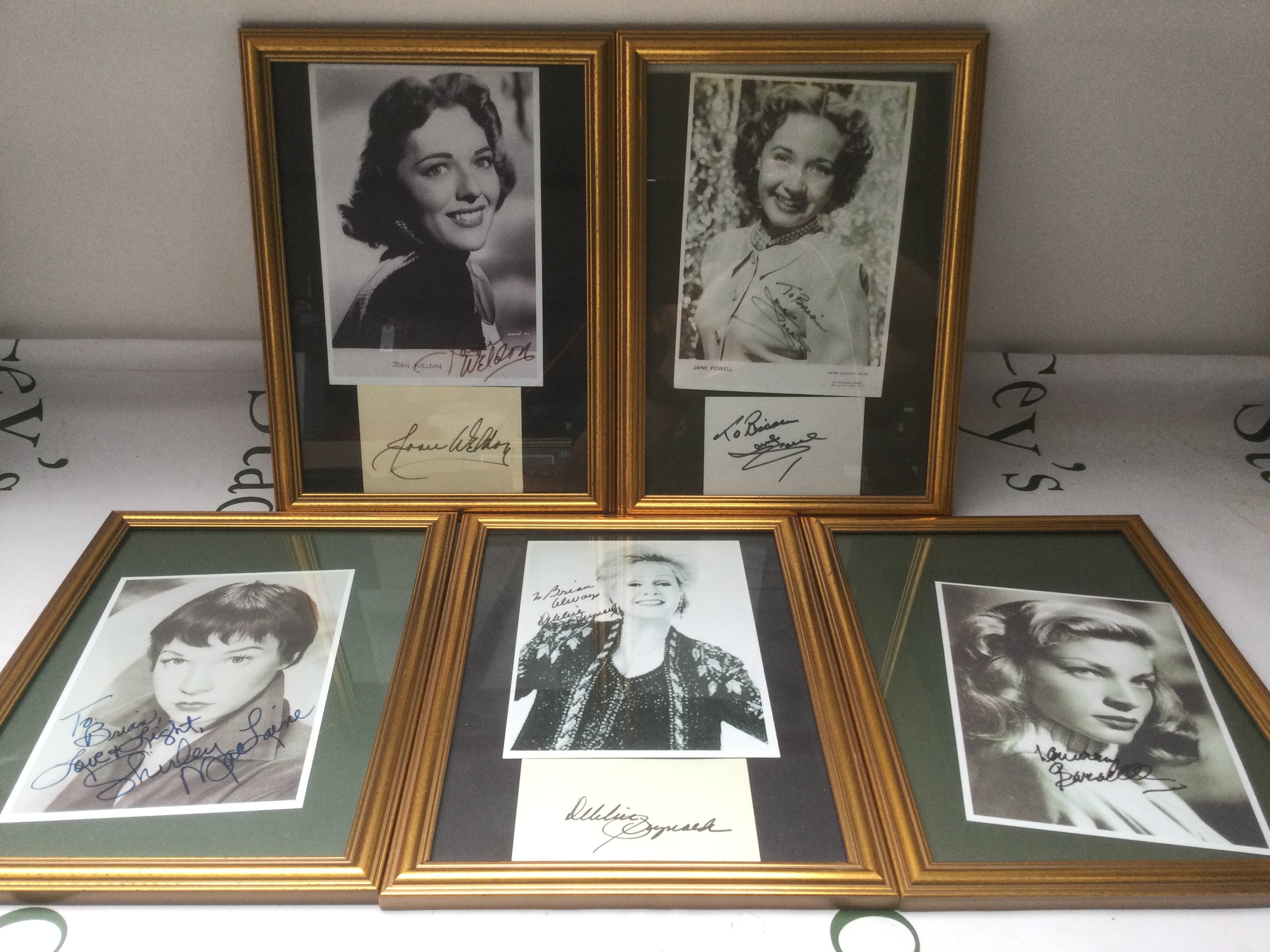 Fifteen signed photos of various film actresses including Shirley Maclaine,