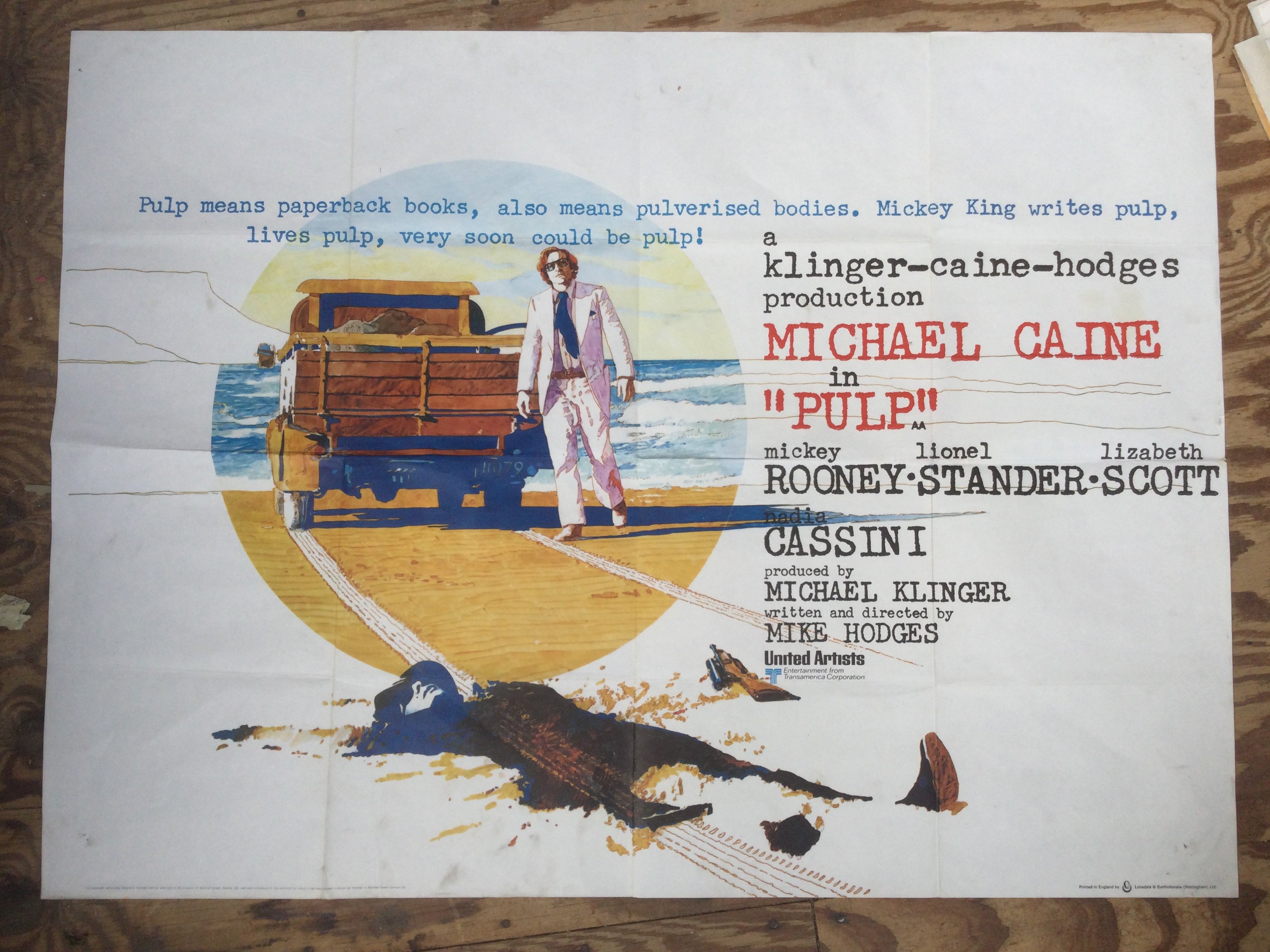 An original UK quad film poster for Pulp starring Michael Caine, approx 101cm x 75cm. Folded with pin holes.