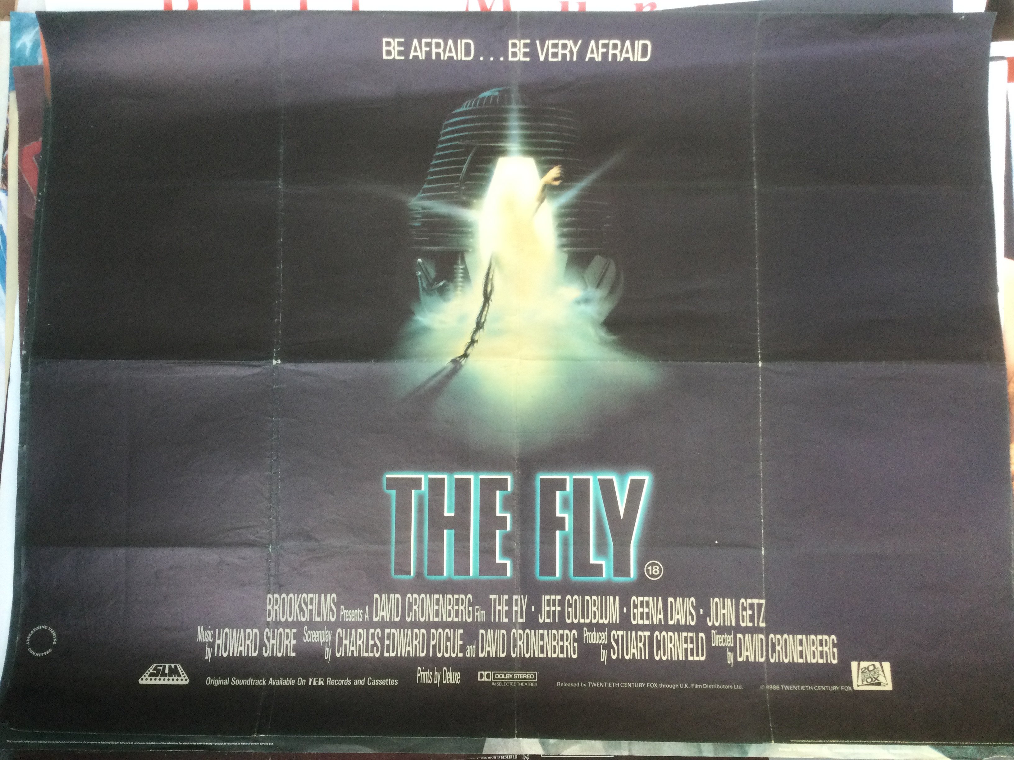 An original UK quad film poster for The Fly, approx 101cm x 76cm. Folded with one small tear and pin holes.